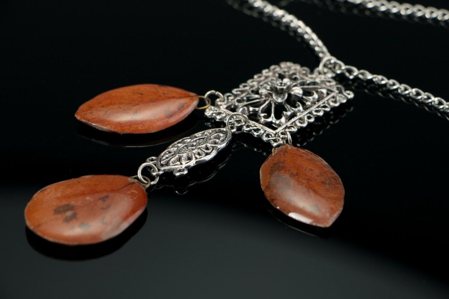Necklace made of leaves of acacia, coated with epoxy resin photo 1