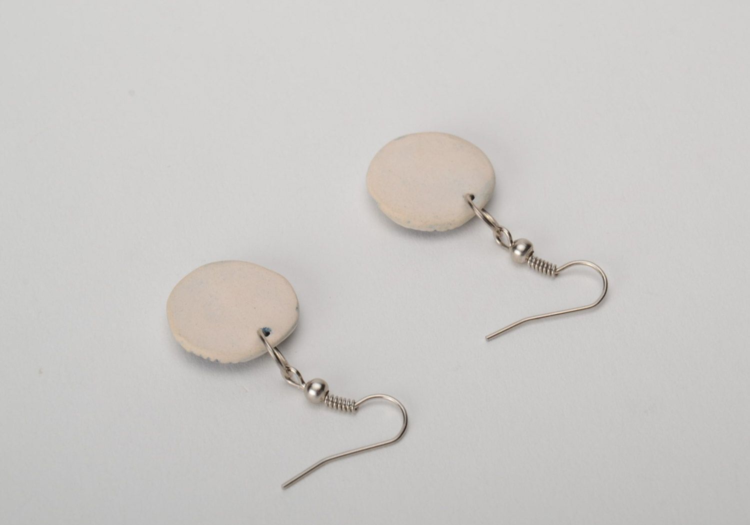 Handmade clay dangle round earrings with pattern of light color photo 4