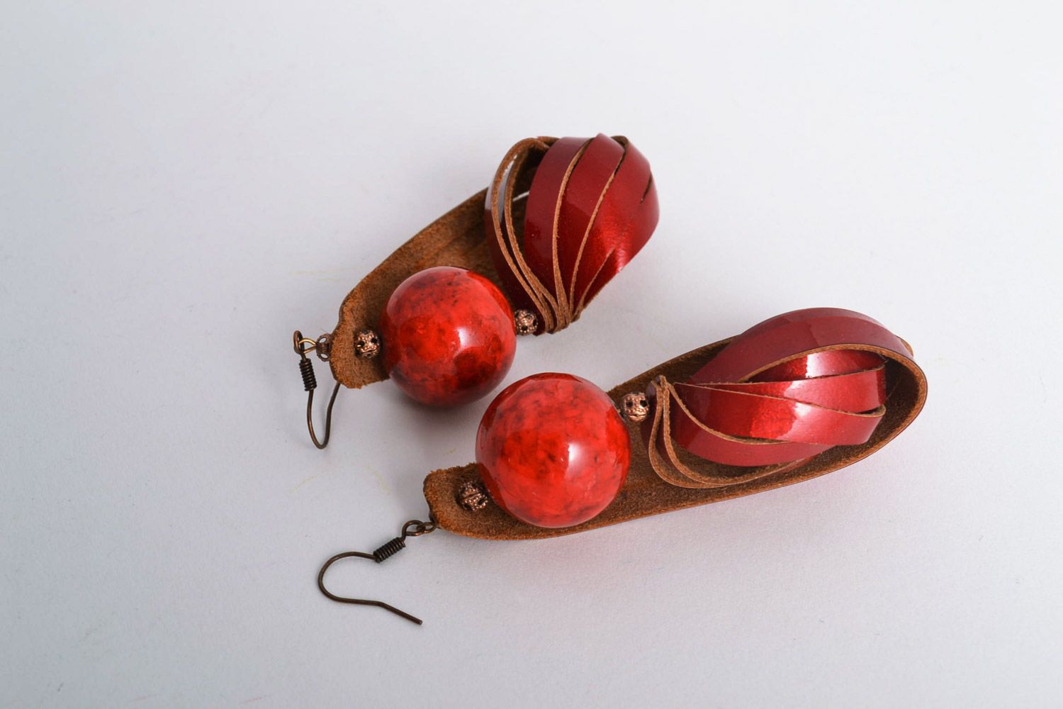 Handmade long earrings made of genuine leather with natural coral stone photo 5