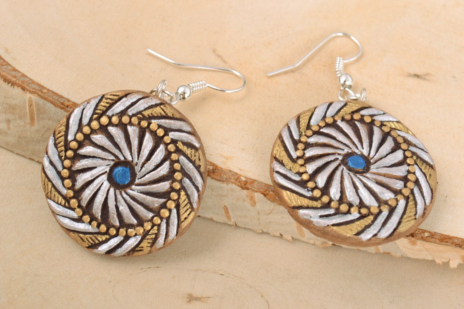 Handmade round ceramic dangling earrings painted in silver and golden colors photo 1