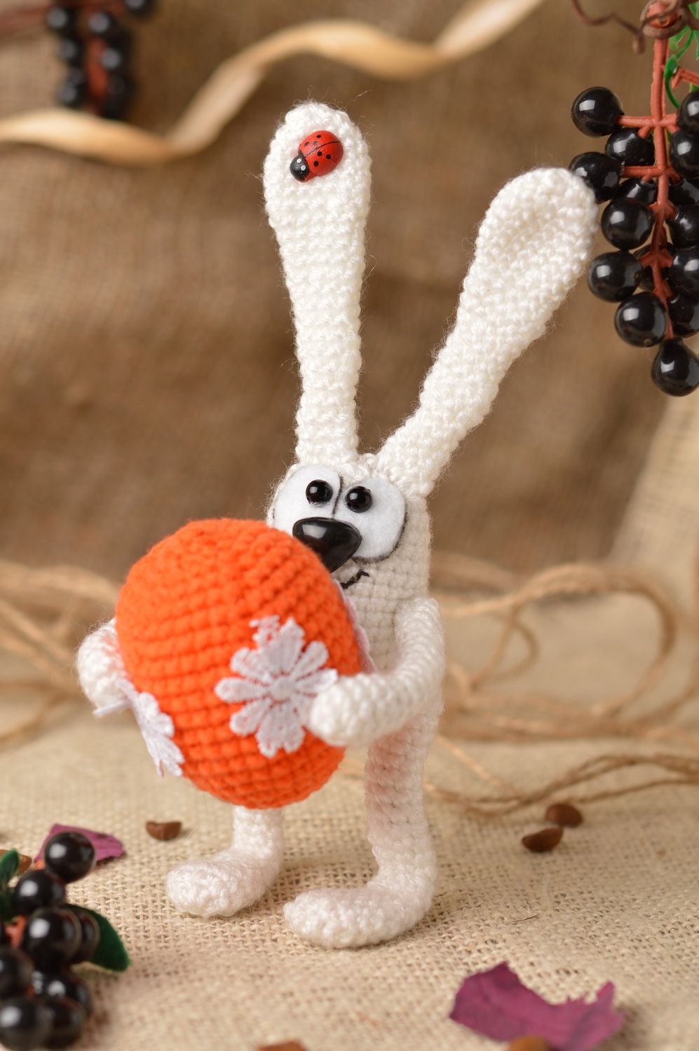 Handmade designer crocheted soft toy funny white rabbit with orange painted egg photo 1