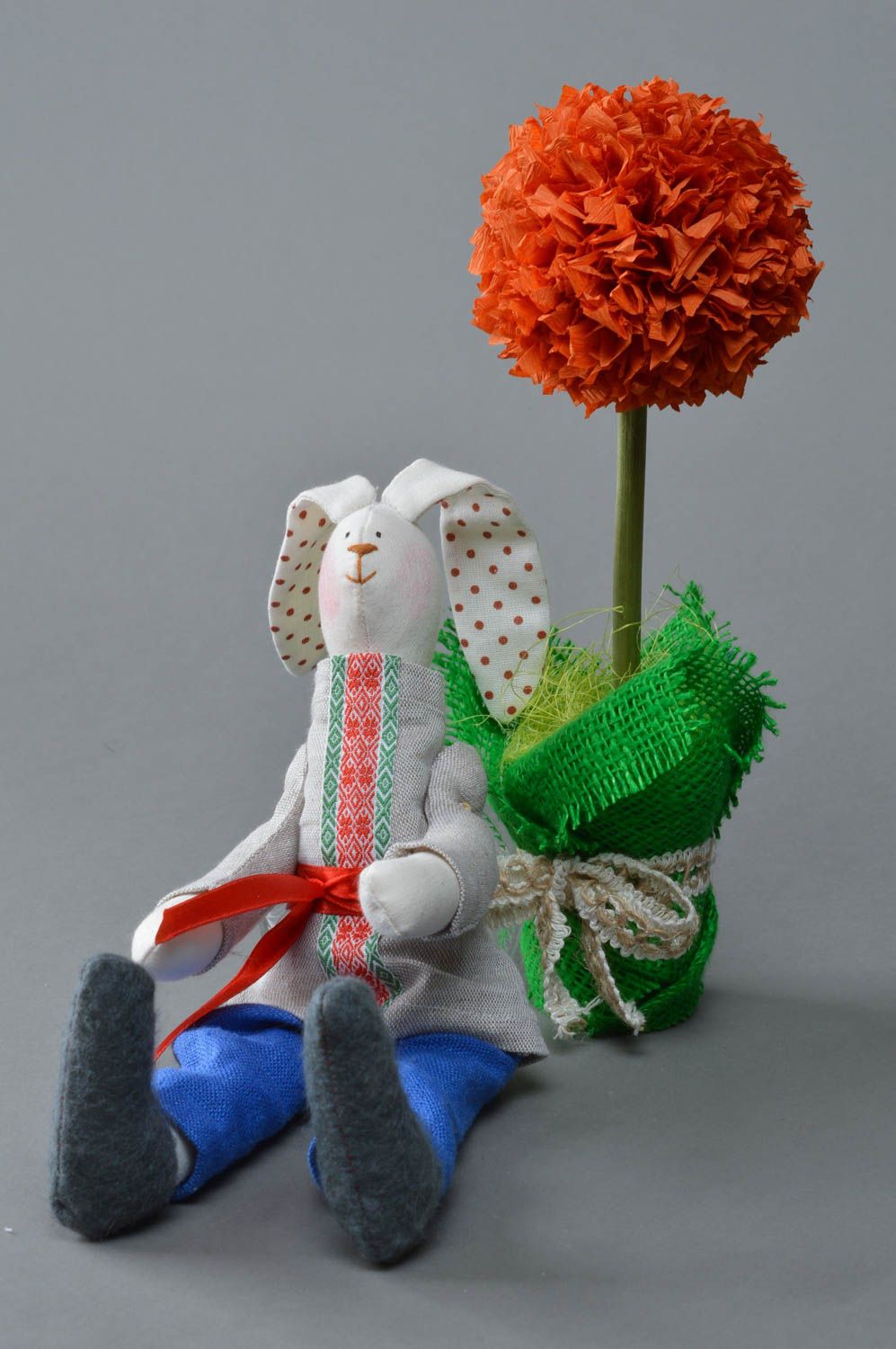 Handmade linen fabric soft toy rabbit in blue trousers and ethnic shirt with belt photo 1