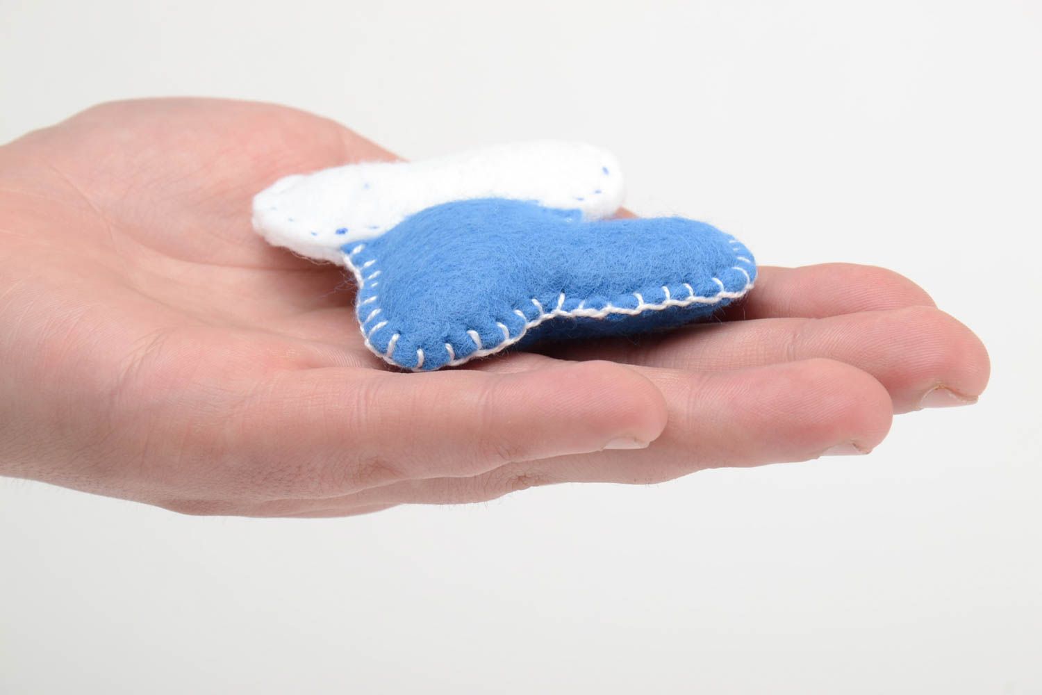 Handmade small soft toy in the shape of bootie sewn of blue and white felt photo 5