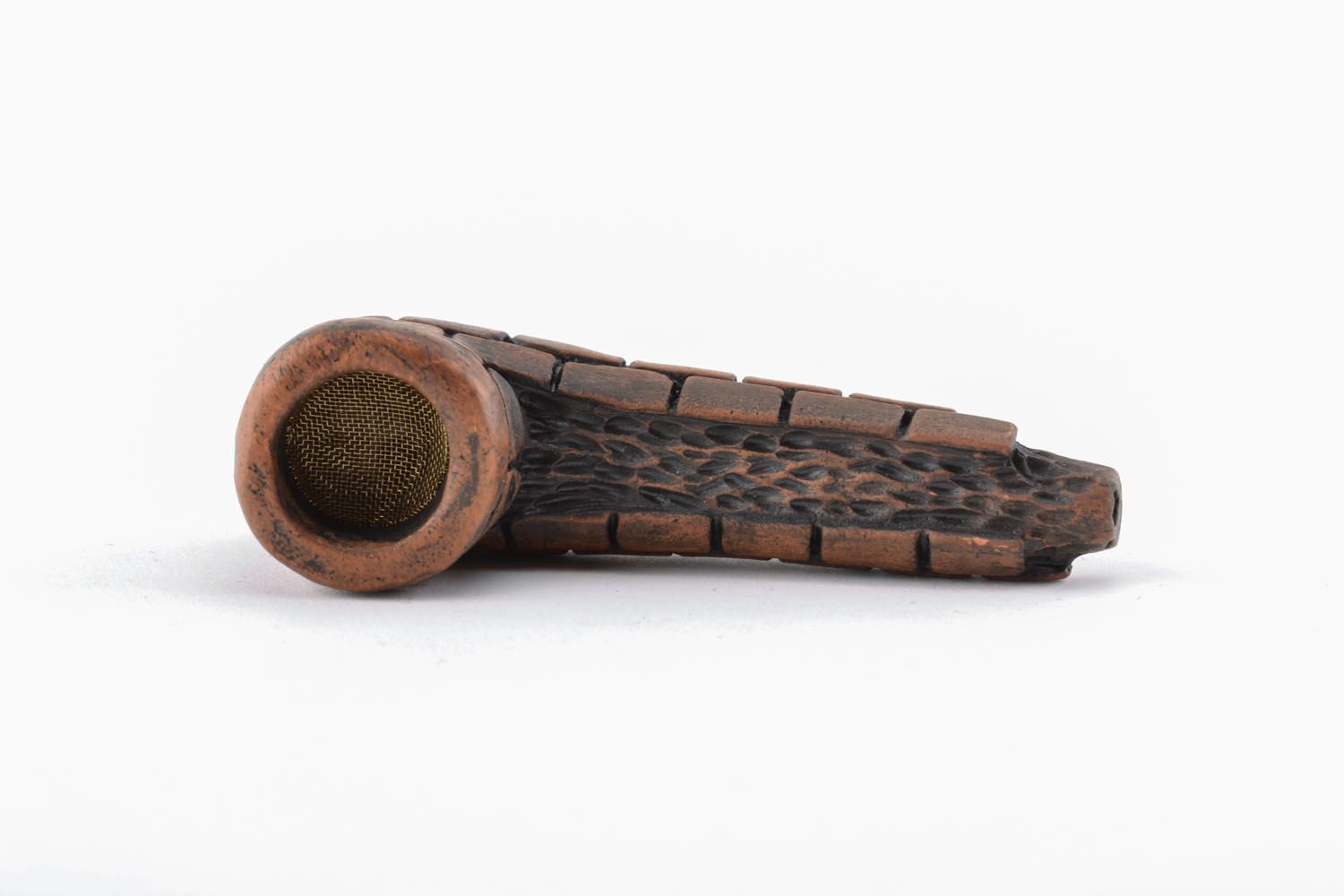 Smoking pipe in ethnic style photo 1