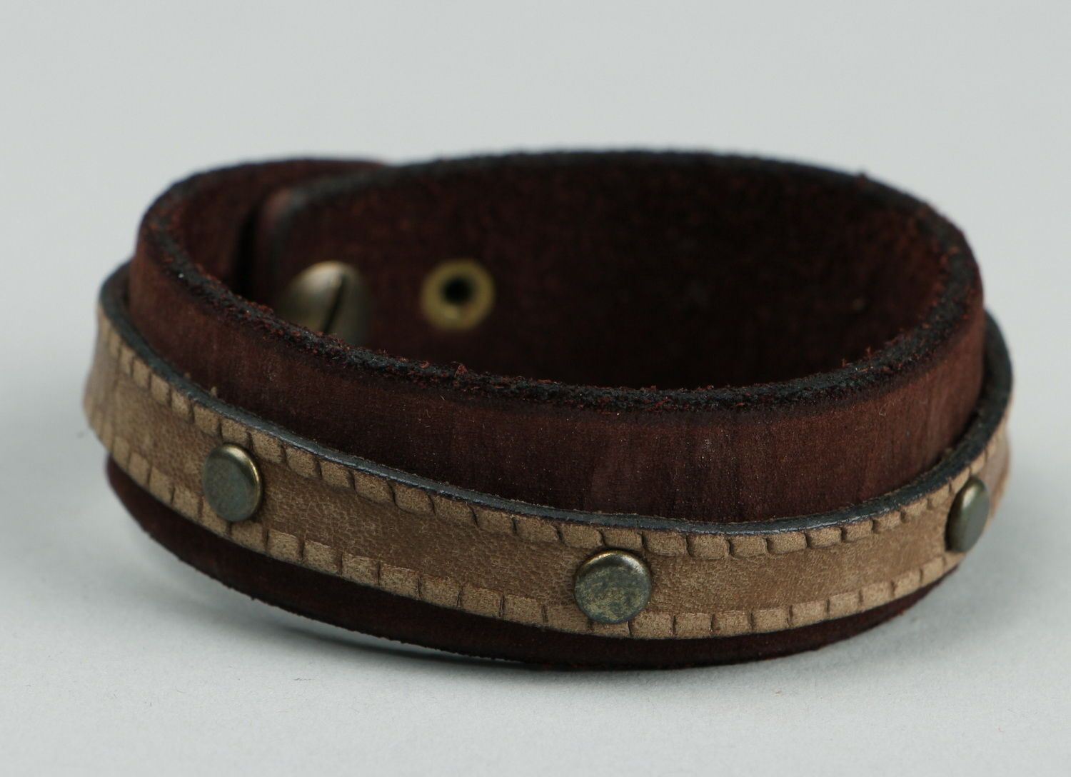 Leather bracelet with rivets photo 1
