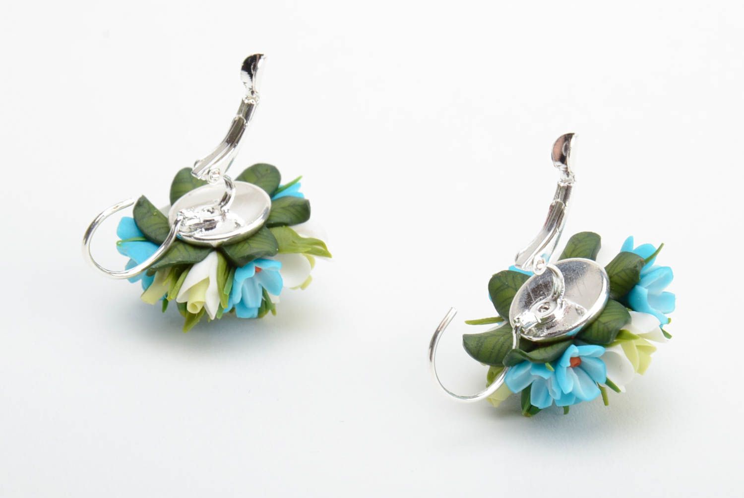 Handmade tender earrings with tiny blue and green polymer clay flowers photo 3