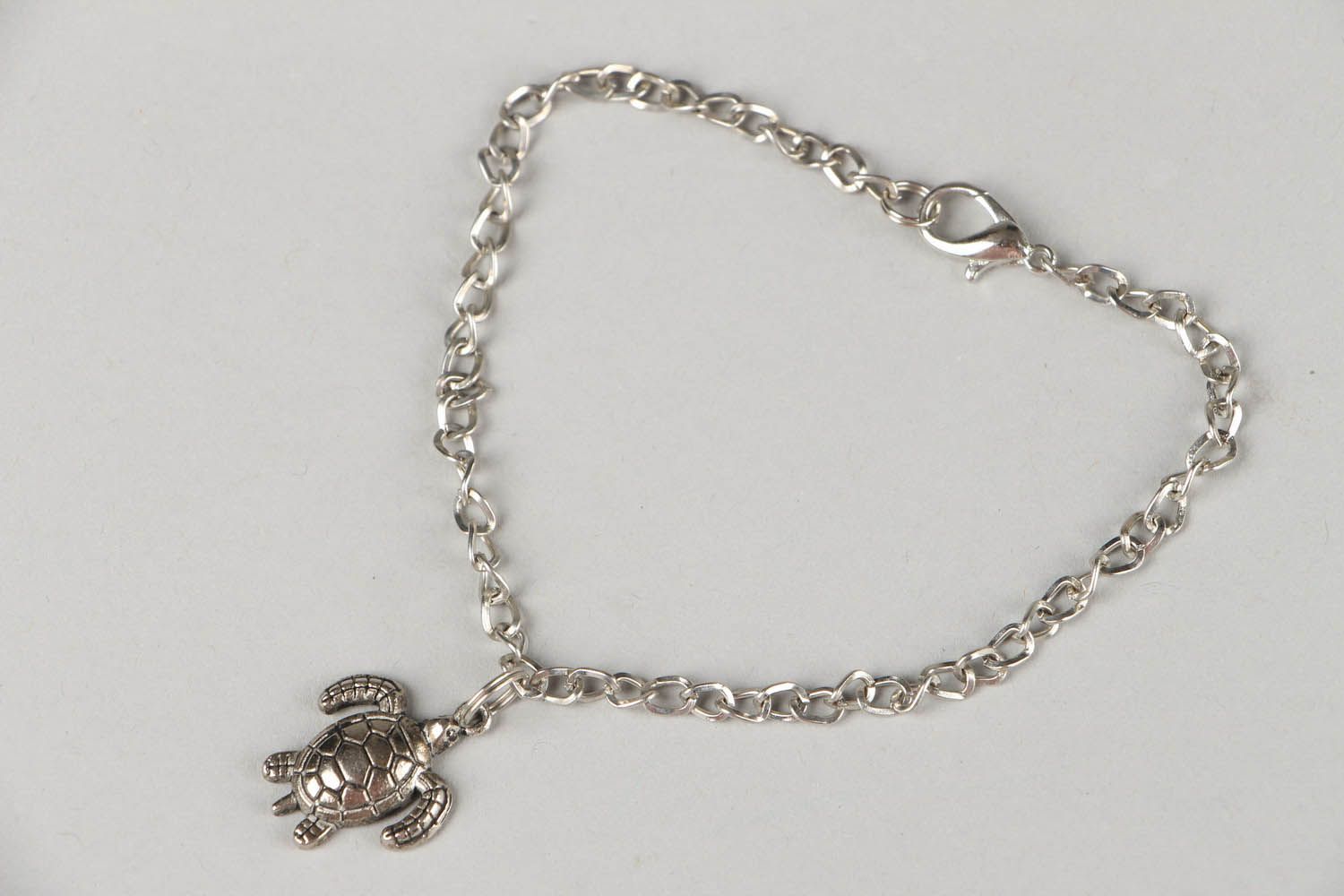 Foot bracelet with a turtle photo 5