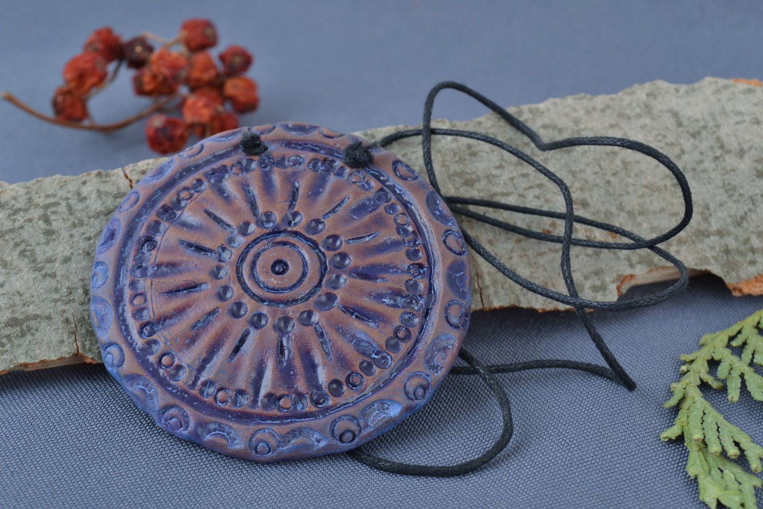 Blue round handmade red clay pendant with cord photo 1