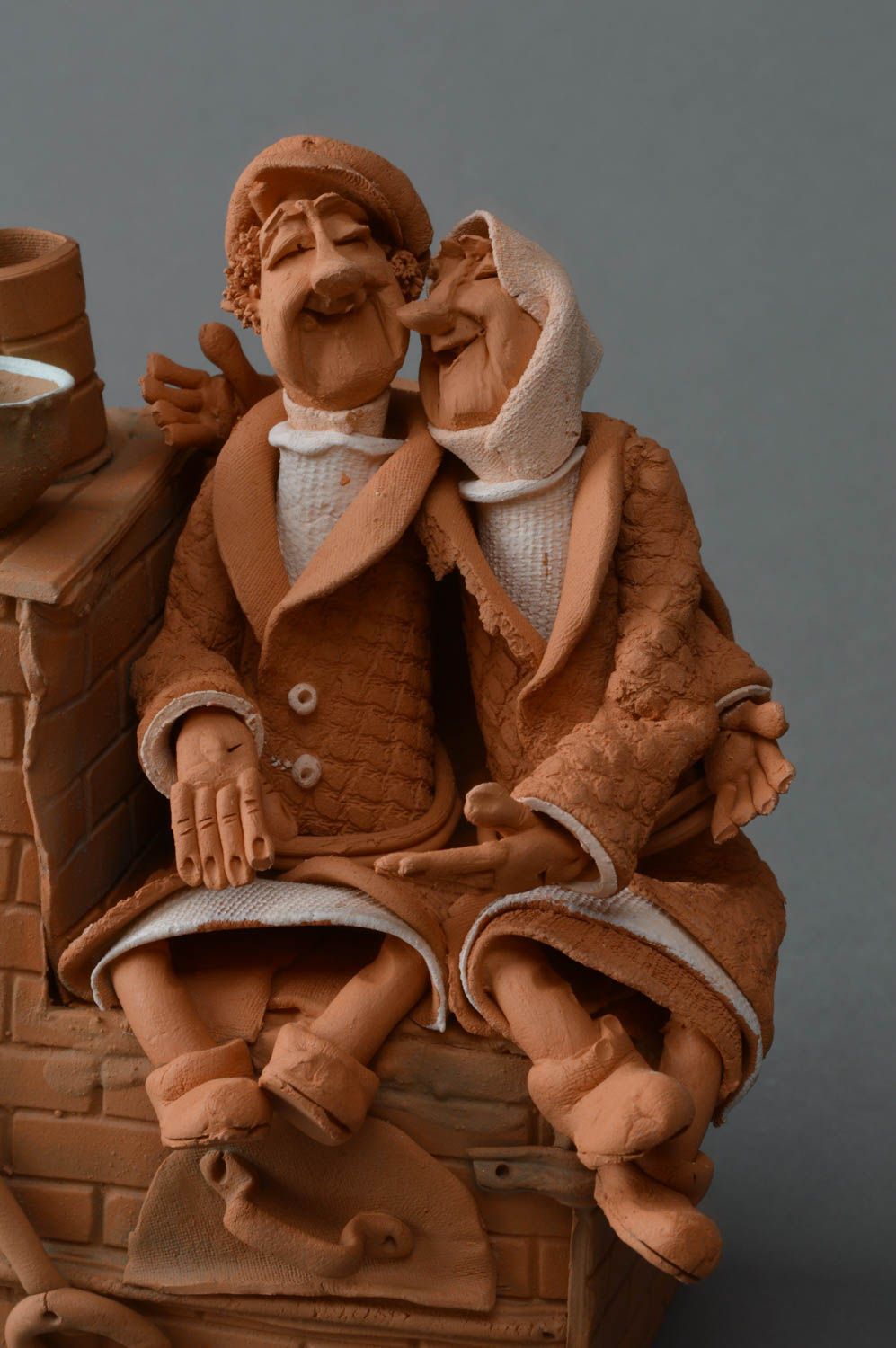 Handmade designer white and red clay figurine of old couple ceramic sculpture photo 2