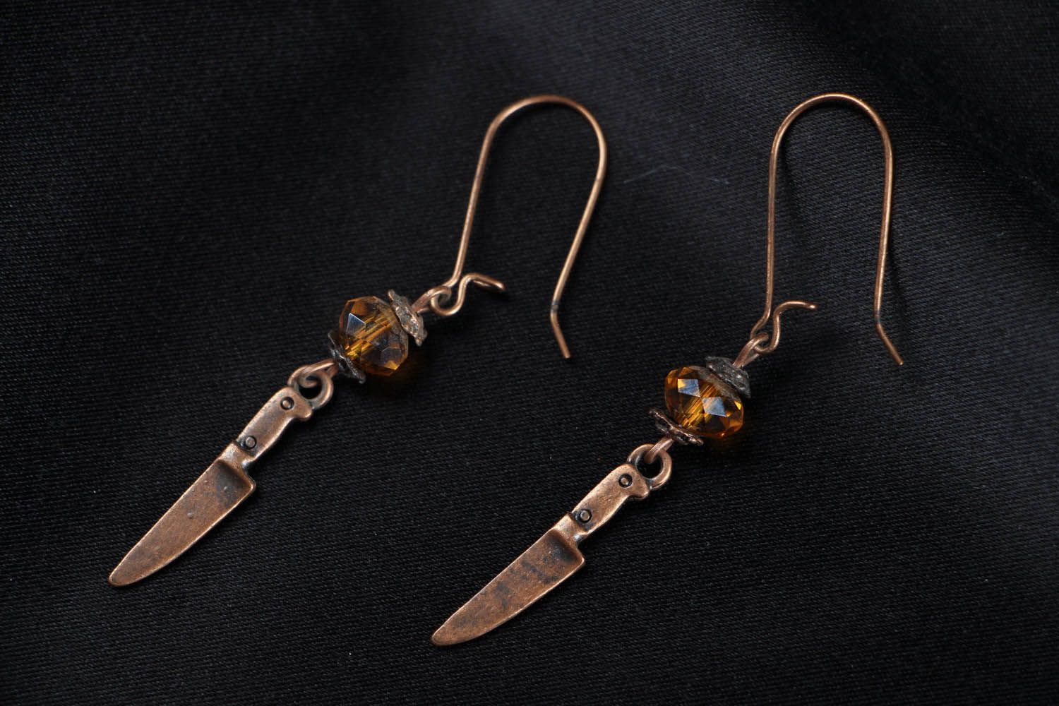 Earrings made of metal and crystal photo 1