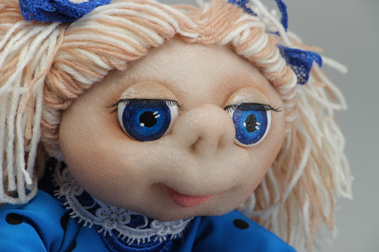Handmade charming soft doll sewn of caprone Doll in blue dress for children photo 2