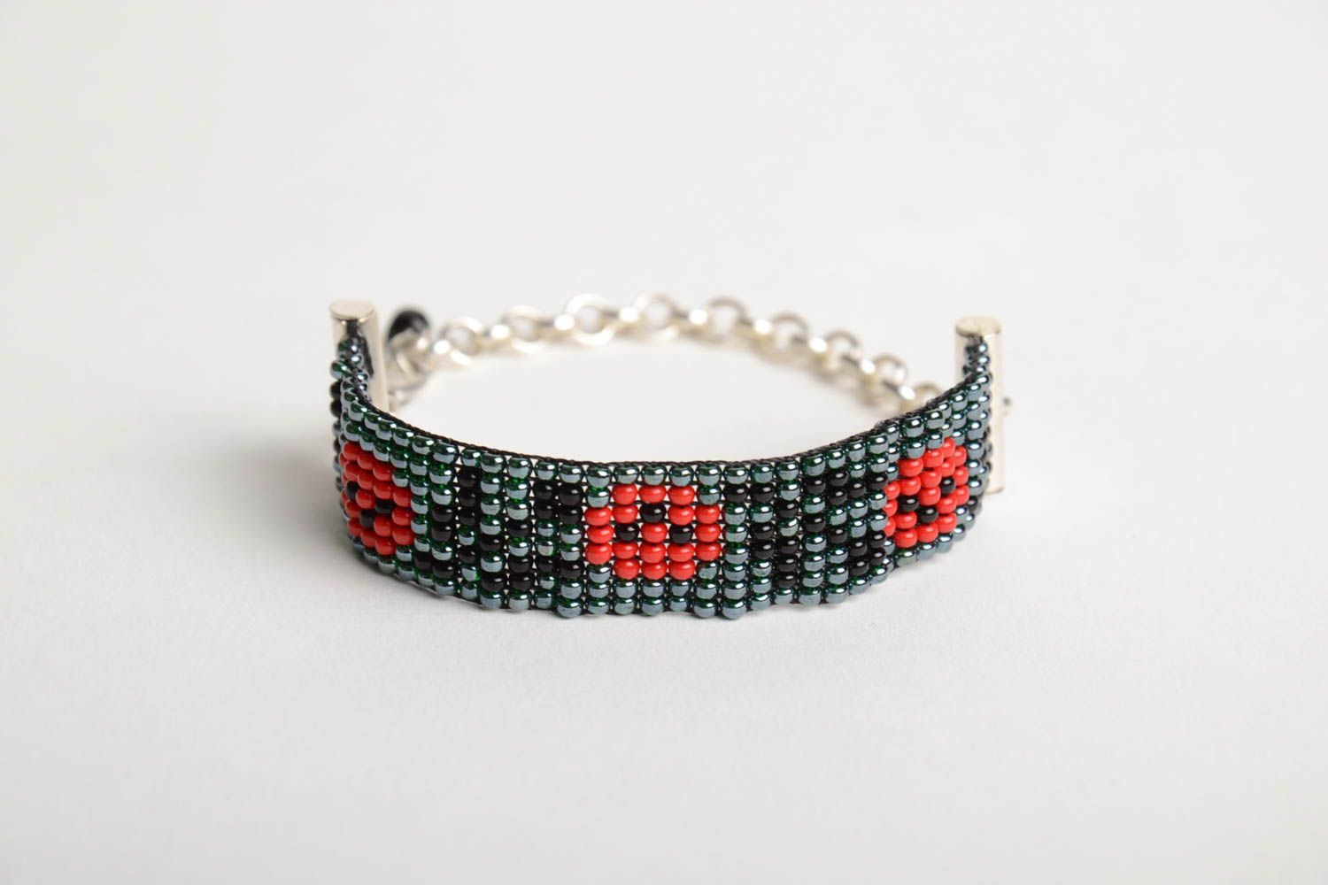 Black and red beads woven line wrist bracelet on a chain with poppies photo 3