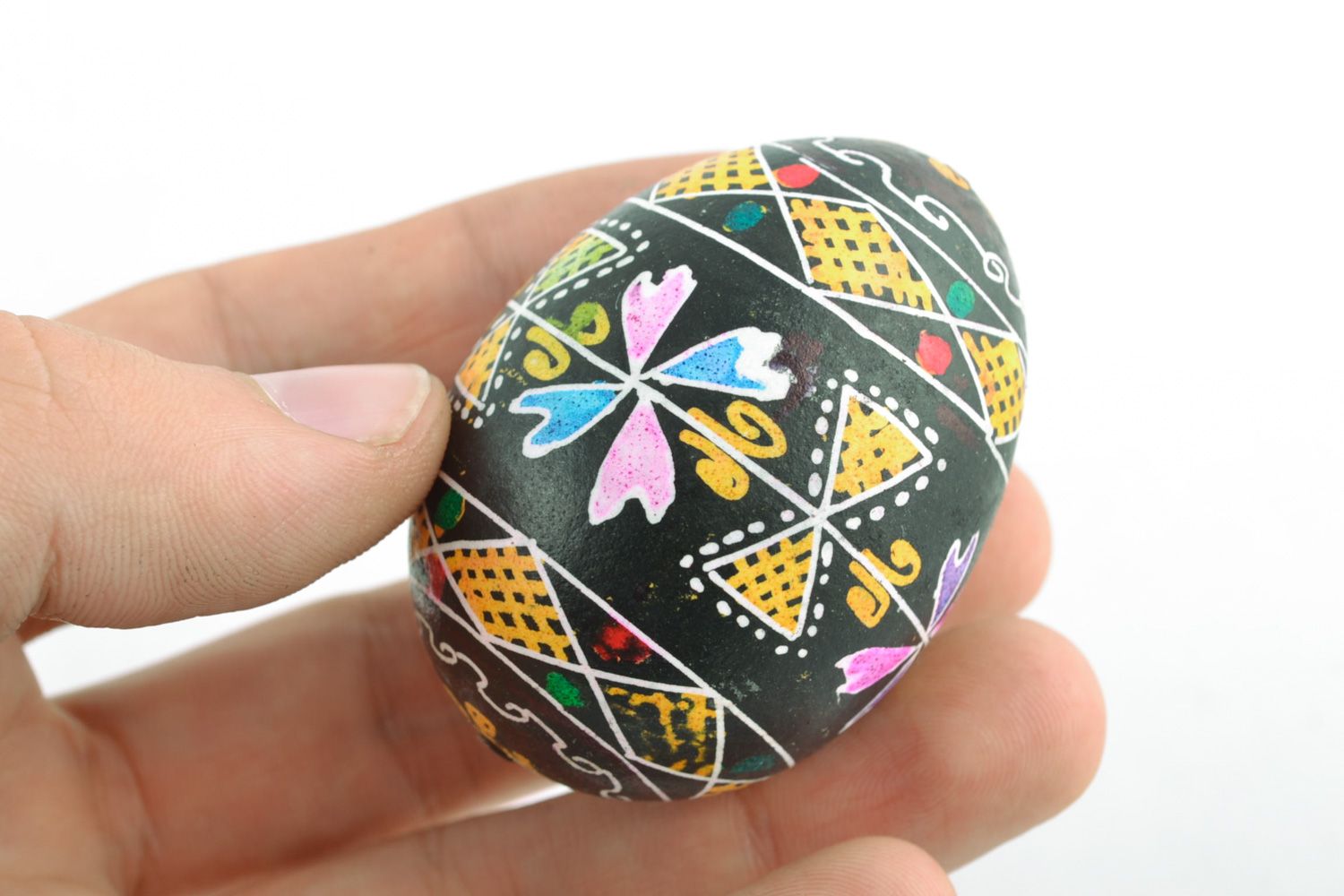 Beautiful colorful Easter egg with traditional painting made using wax technique photo 2