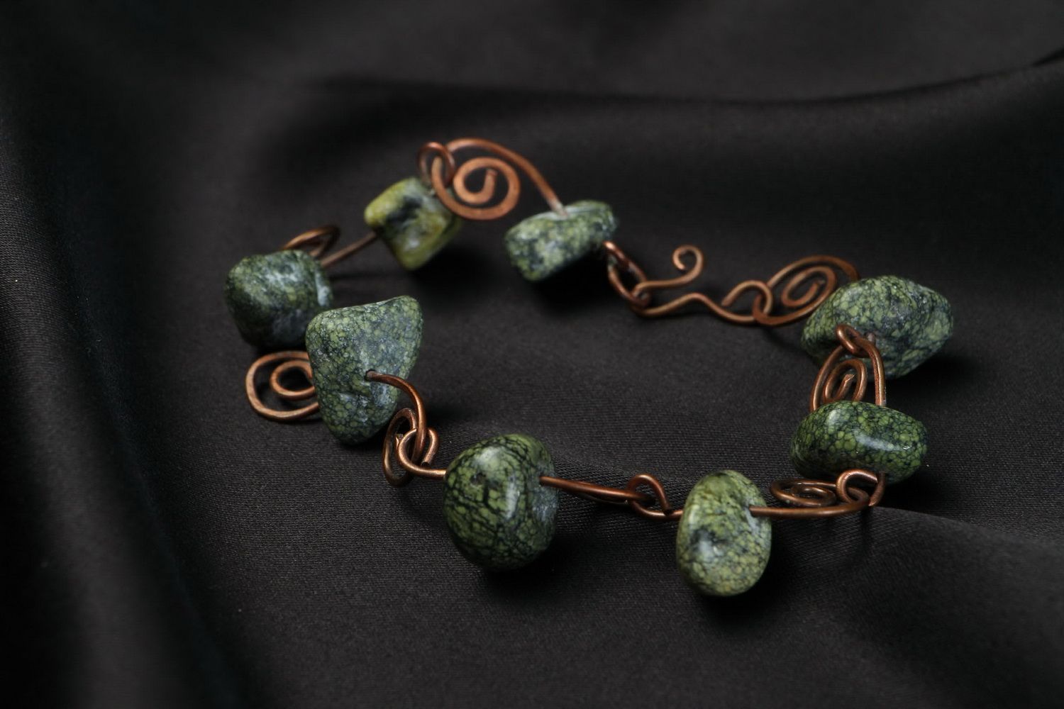 Copper bracelet with a coil stone photo 2