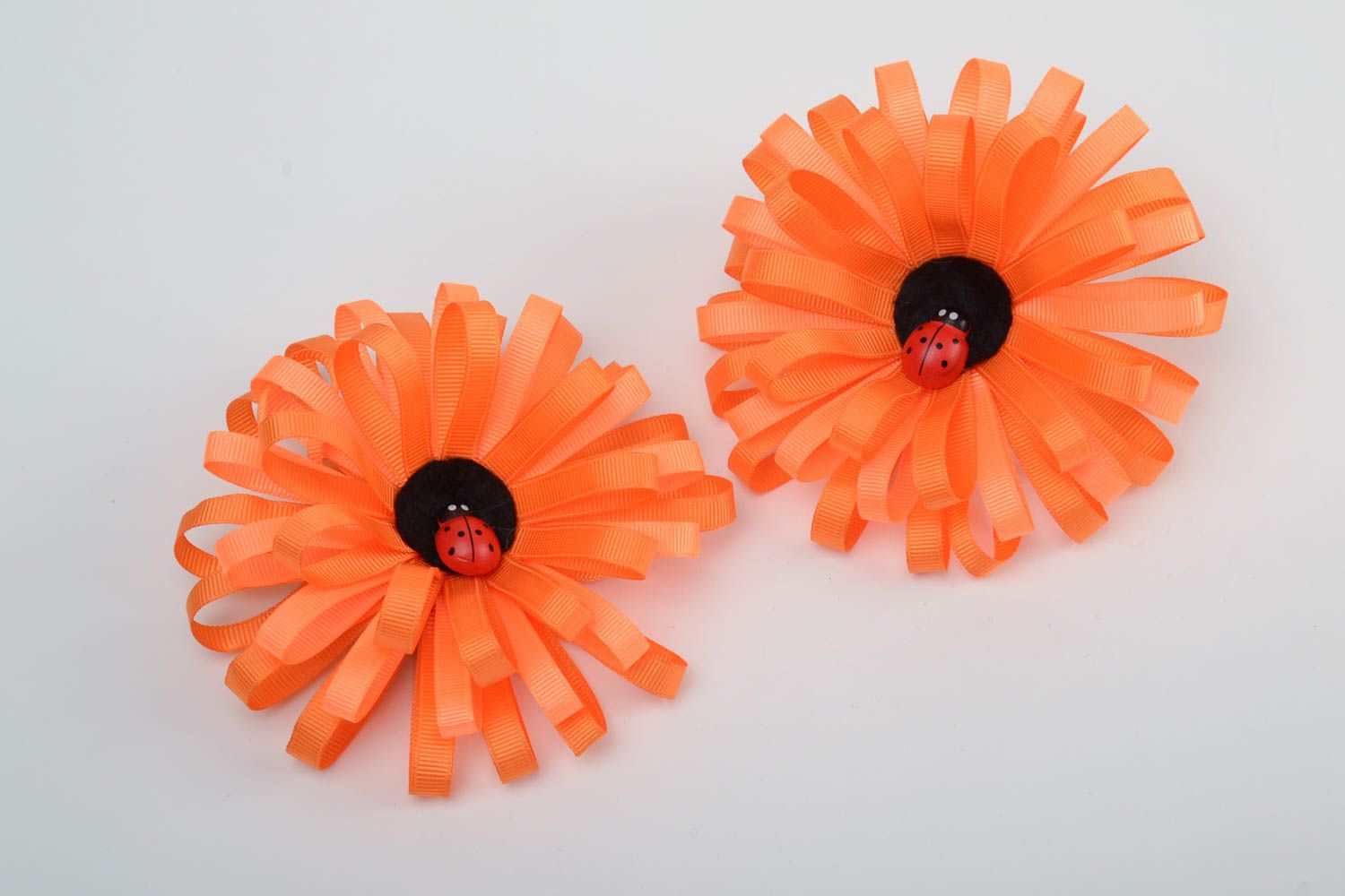 Handmade decorative orange elastic hair band with large volume rep ribbon flower photo 2