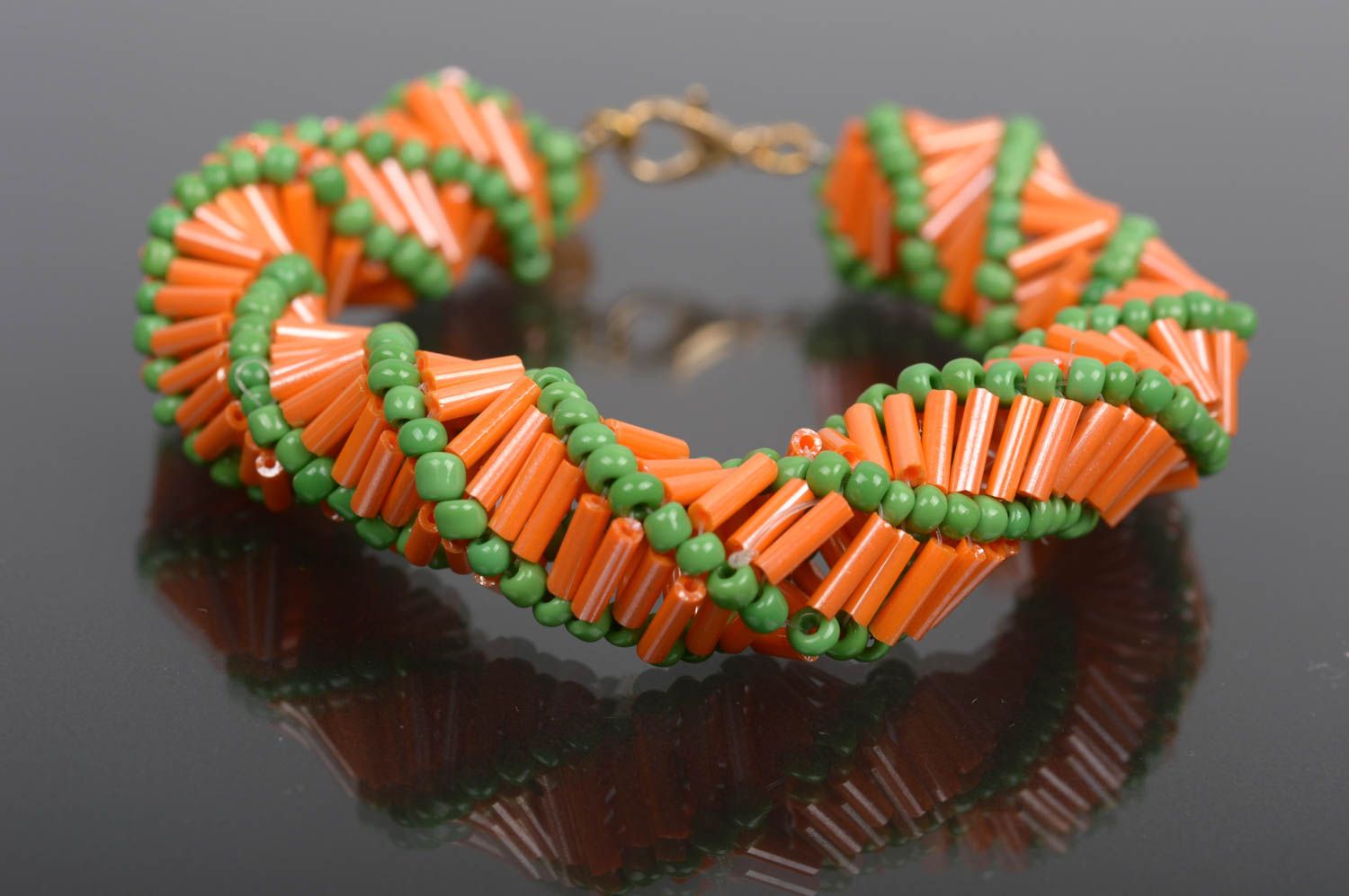 Handmade beaded cord bracelet made of orange and light green beads for women photo 1