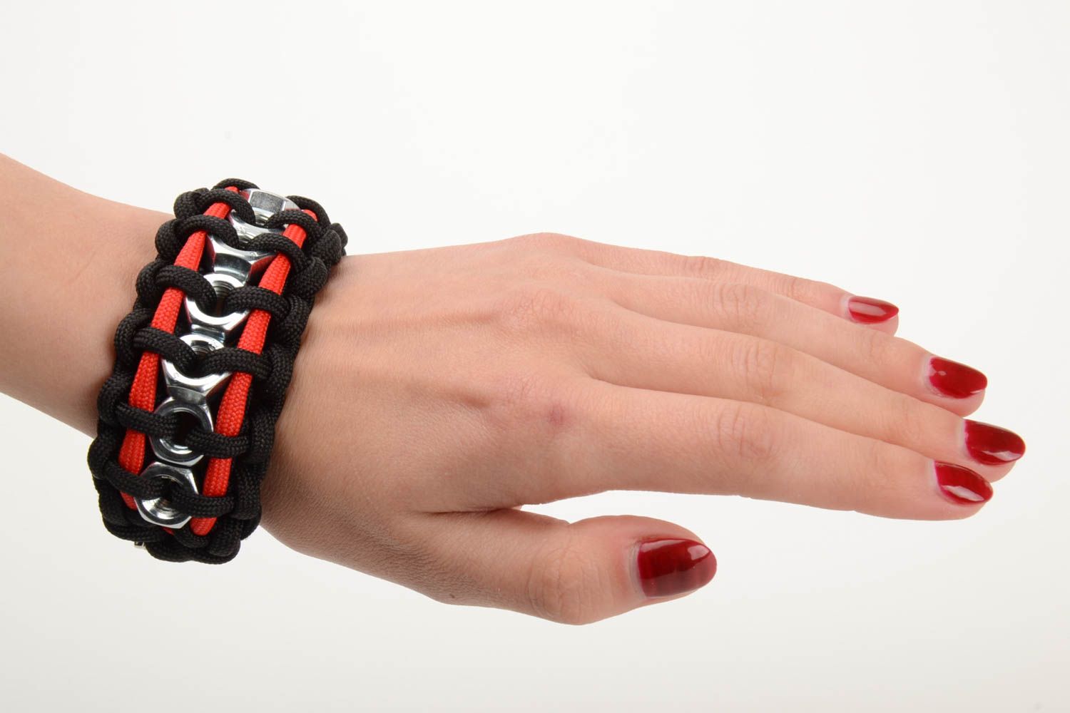 Unusual black and red woven paracord bracelet with metal nuts and fastener handmade photo 5