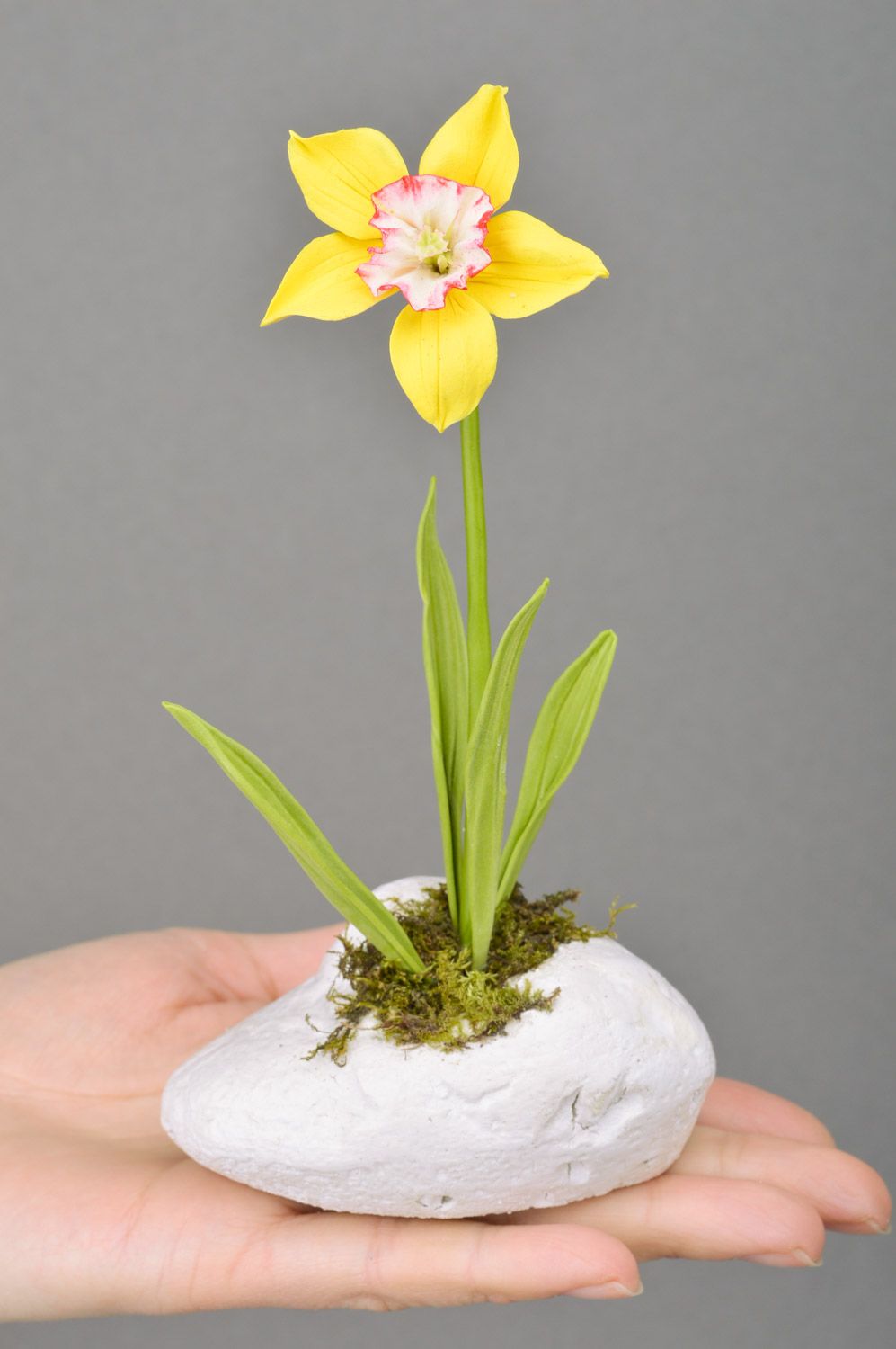 Handmade decorative yellow narcissus flower molded of polymer clay on stone basis photo 3