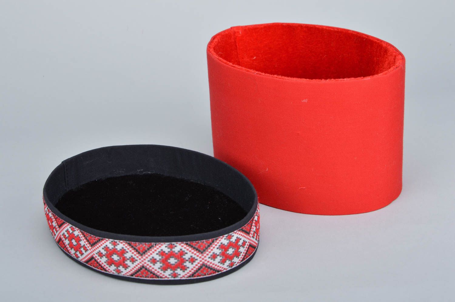 Handmade decorative oval carton box covered with red fabric with ethnic motifs photo 4