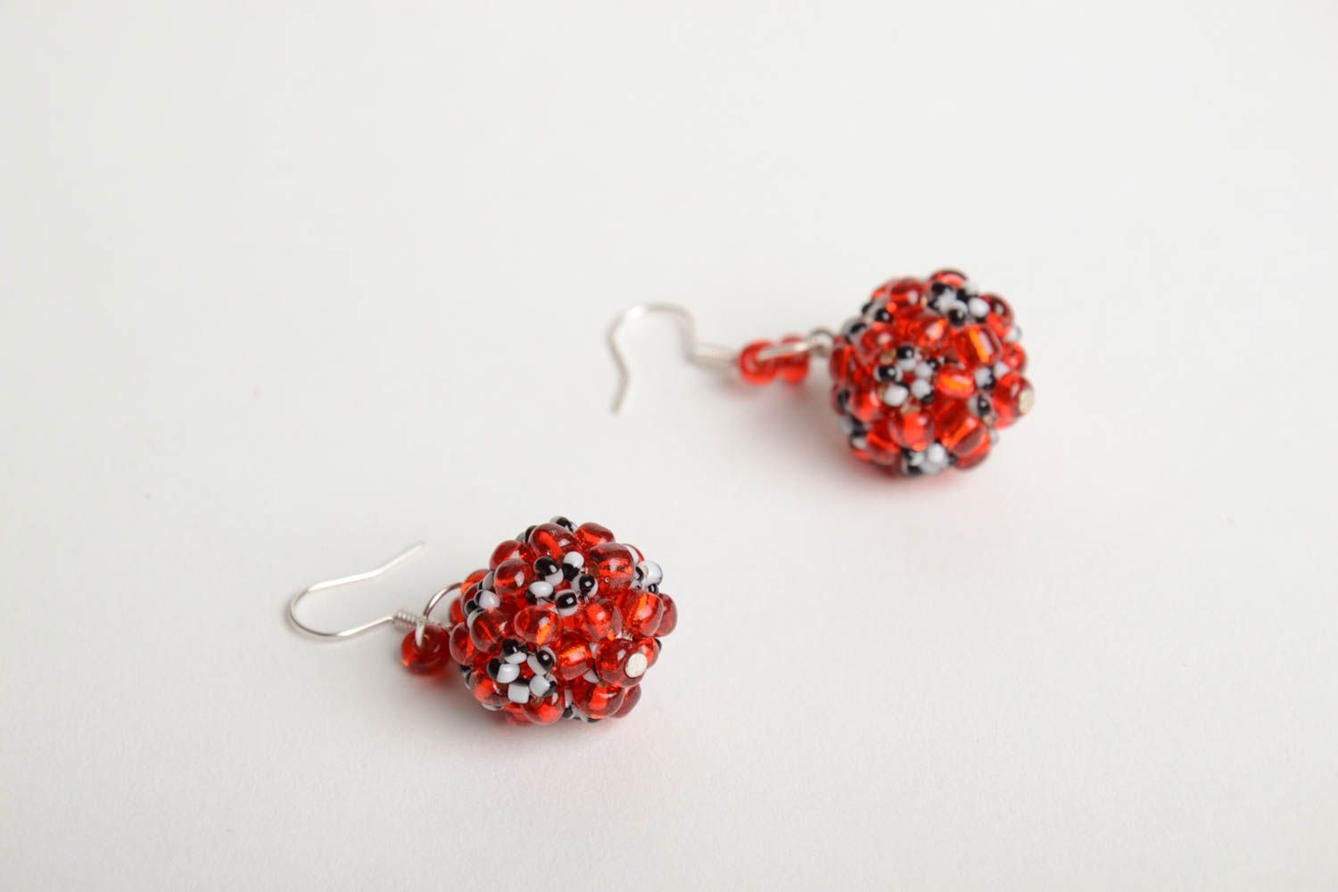 Handmade designer ball shaped dangling earrings crocheted of red Czech beads photo 4