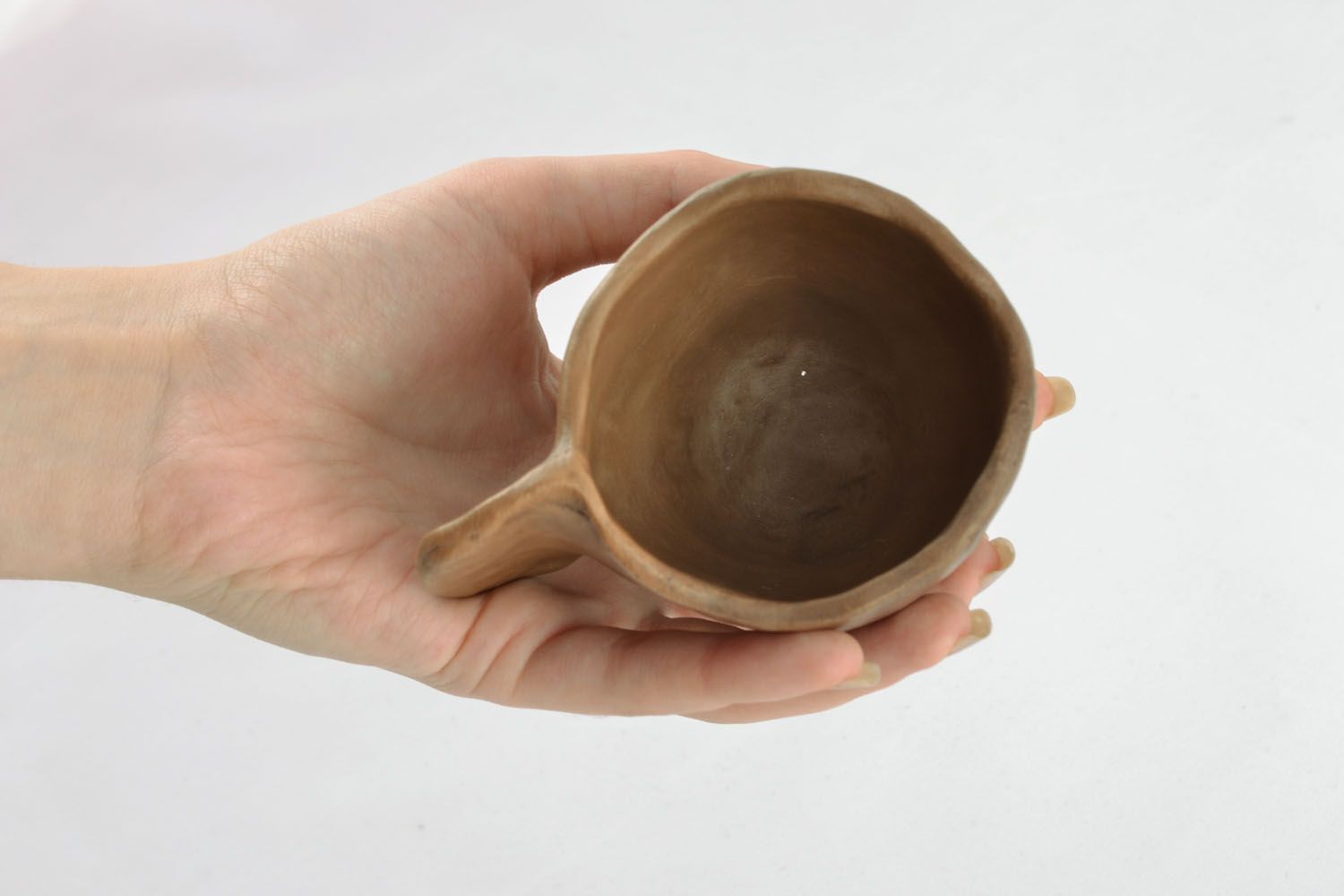 Unique hand-molded ceramic glazed coffee cup with handle  photo 4