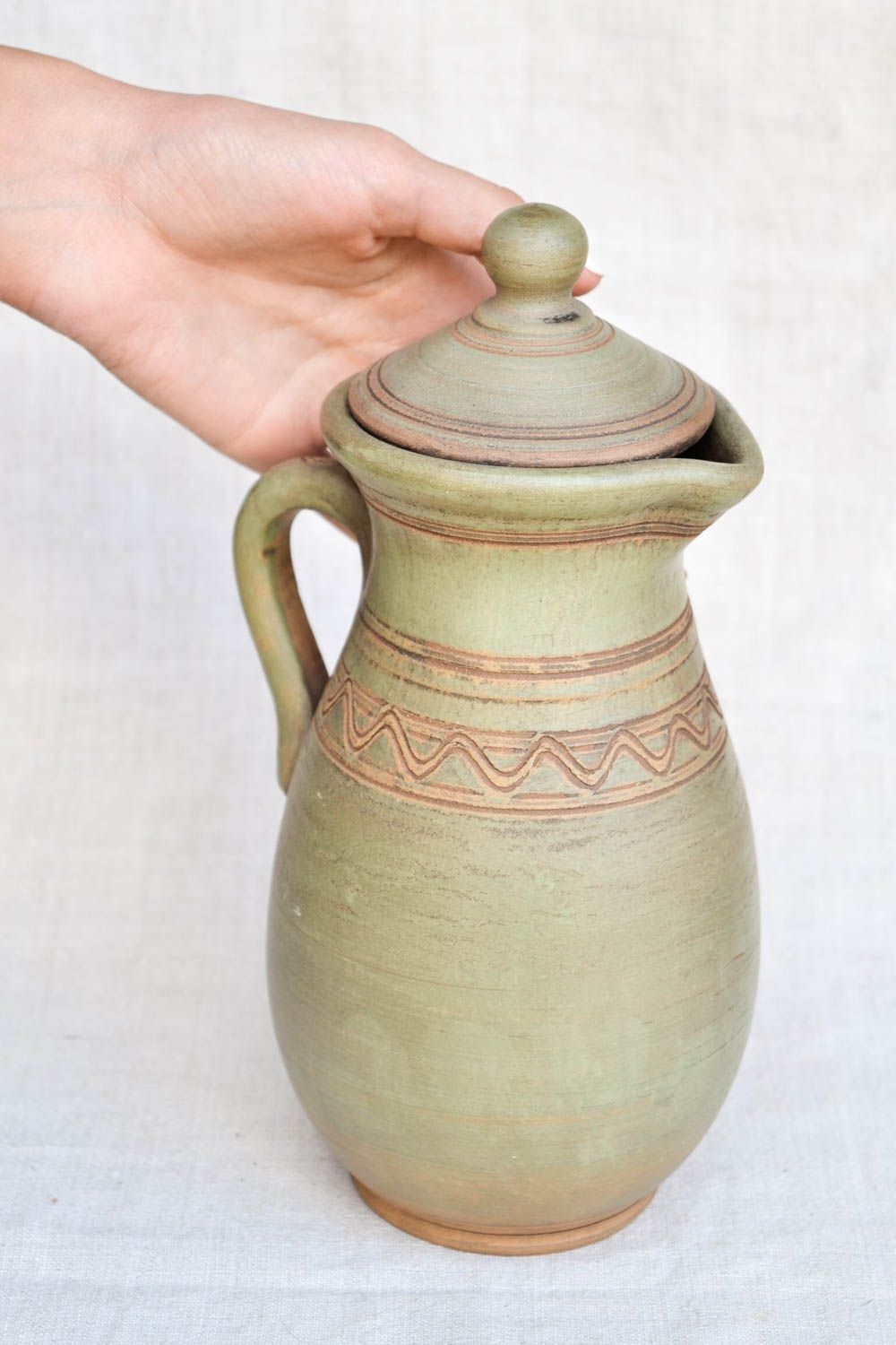 11 inches ceramic 100 oz wine jug in olive color with molded décor 2,6 lb photo 2