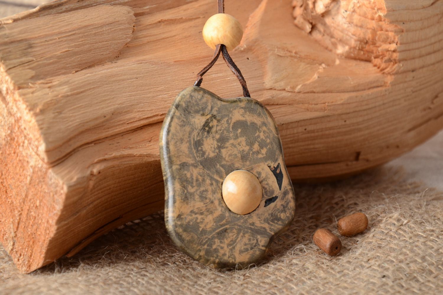 Handmade wooden carved tinted neck pendant of irregular shape for women photo 1
