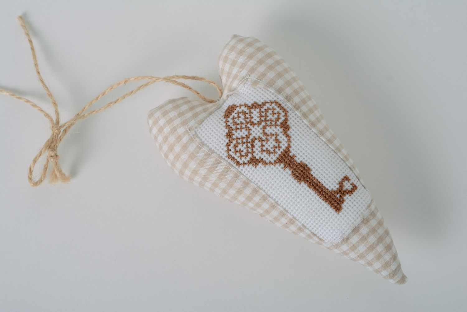 White and brown handmade heart-shaped wall hanging sewn of fabric with embroidery photo 1