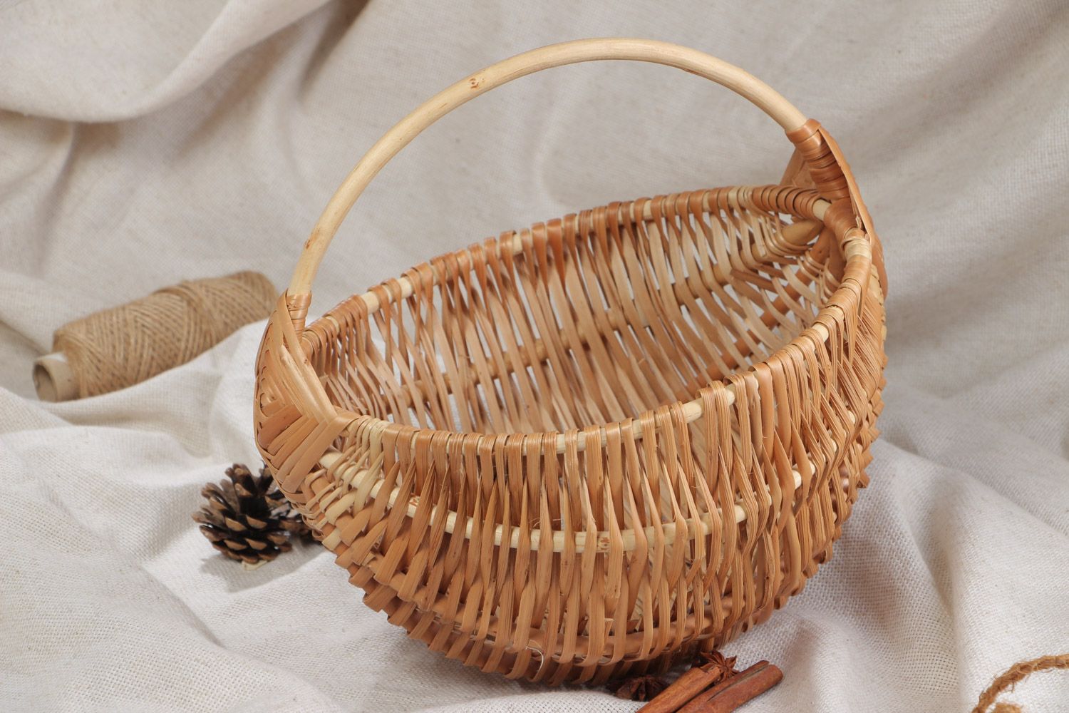 Small beautiful handmade Easter basket woven of willow withe of light color photo 1