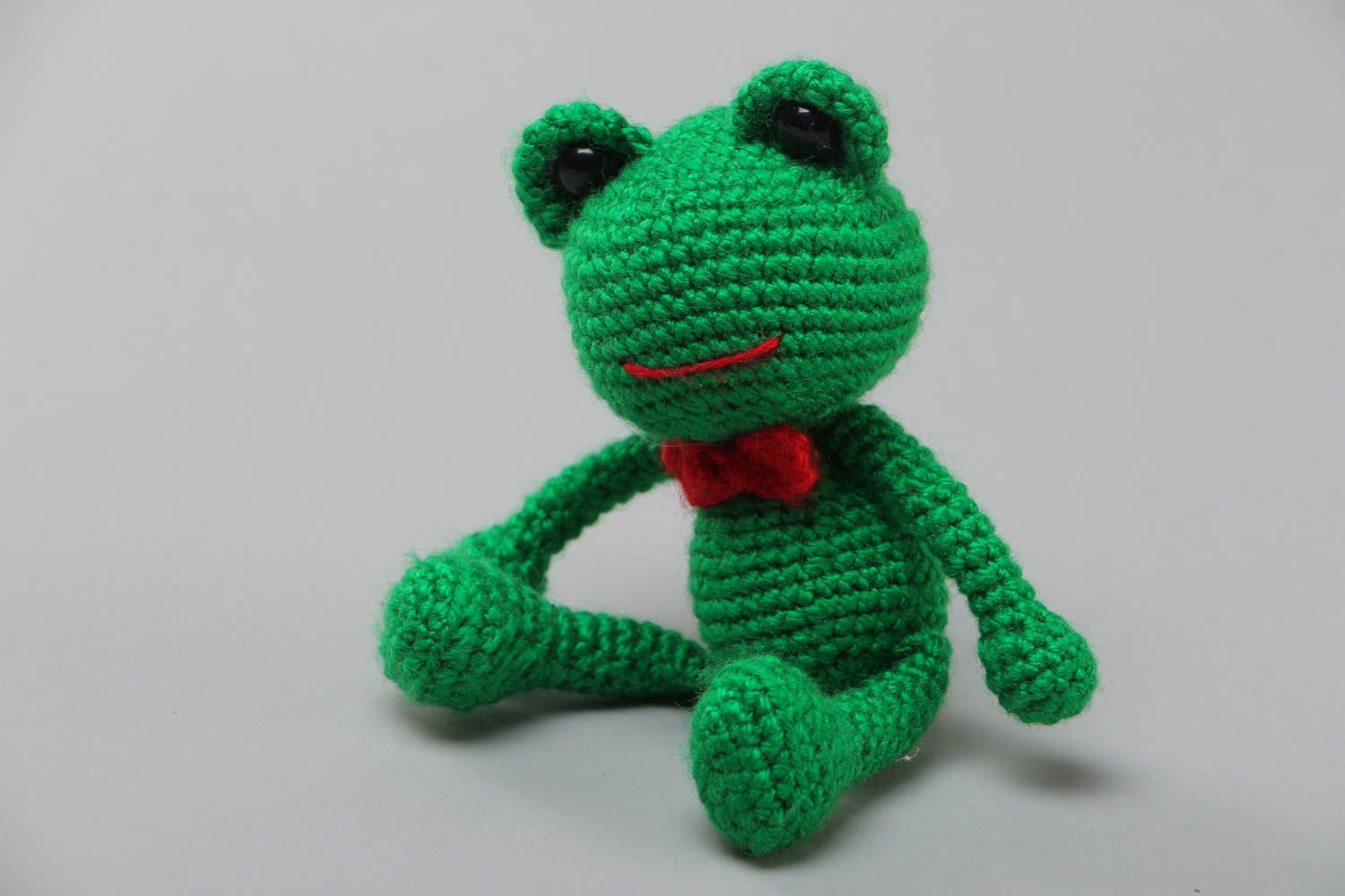 Handmade soft toy crocheted of acrylic threads bright green frog for children photo 2