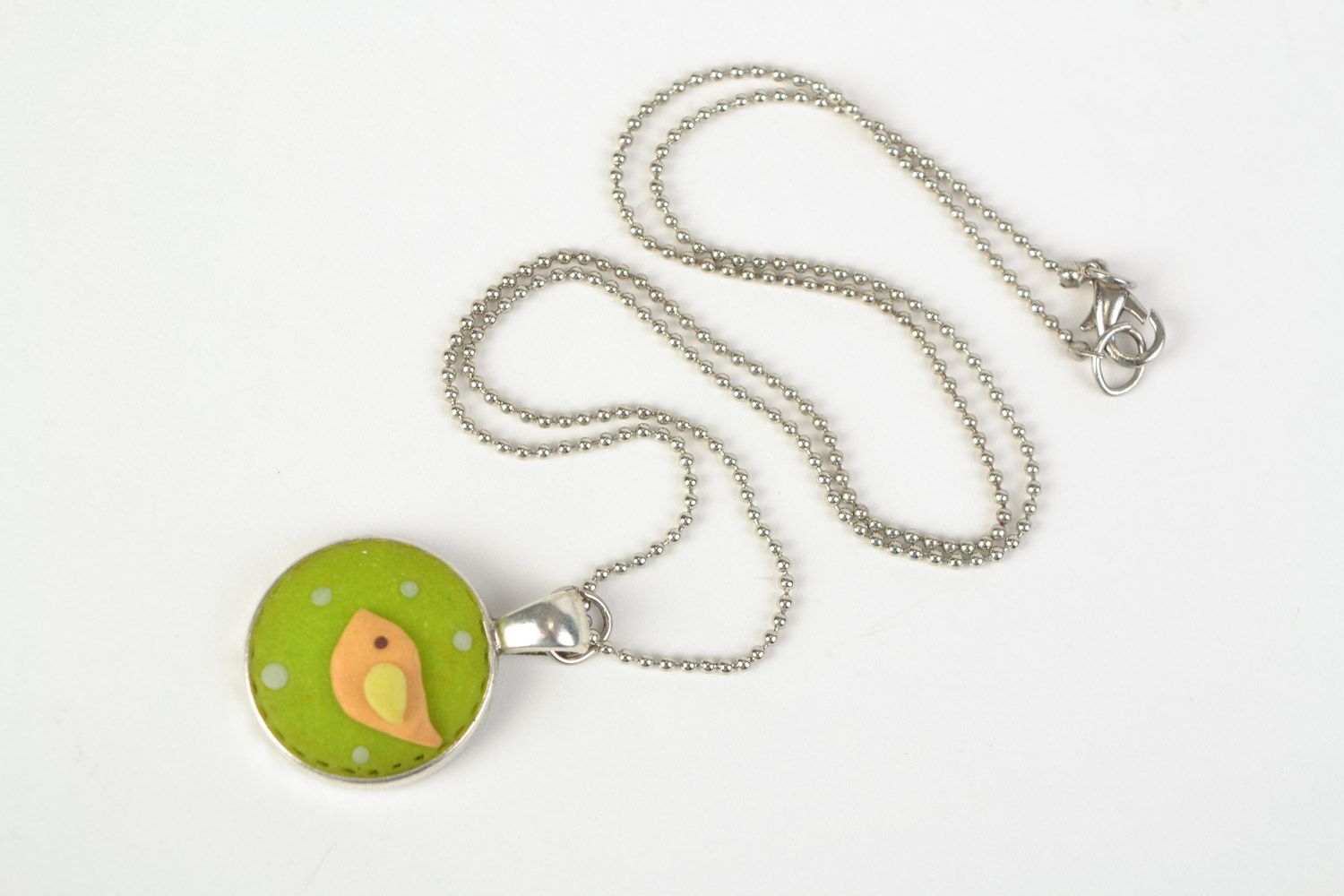 Handmade small round neck pendant molded of polymer clay on long chain Bird photo 1