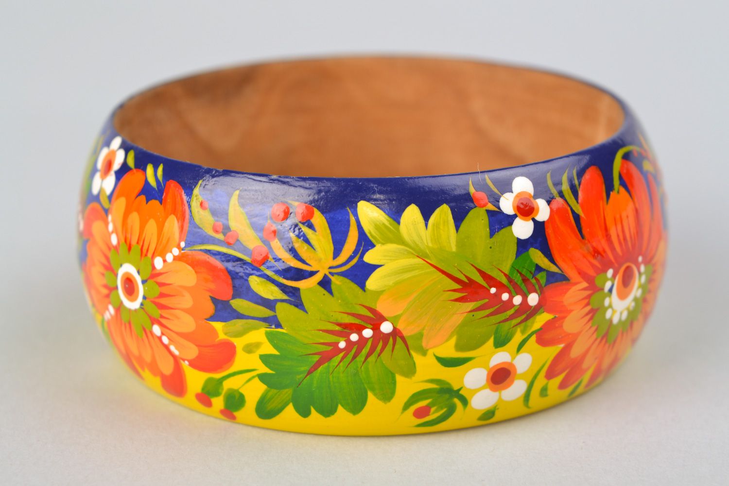 Handmade wooden wrist bracelet with traditional Petrikivka painting photo 3