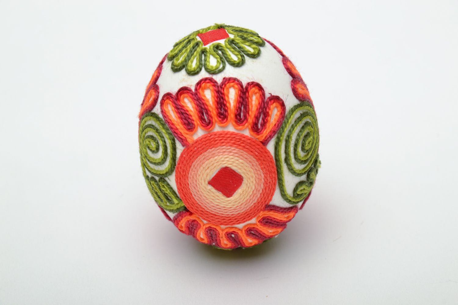Bright handmade Easter egg decorated with threads photo 2