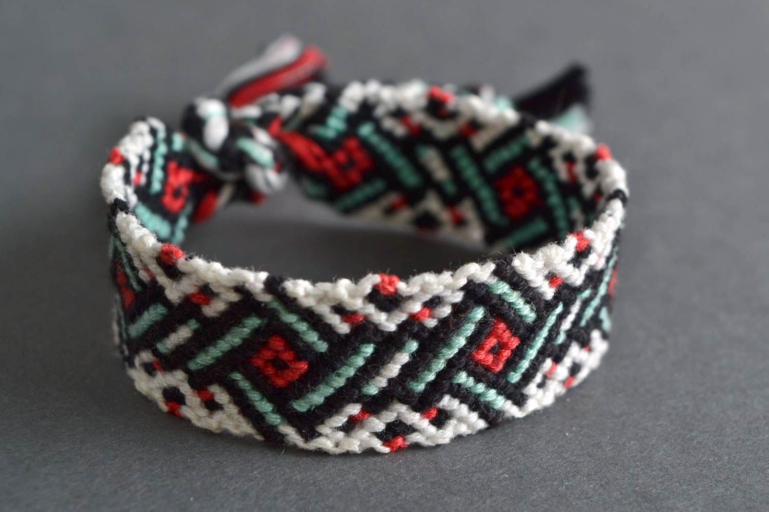 Handmade woven macrame friendship wrist bracelet with patterns photo 1