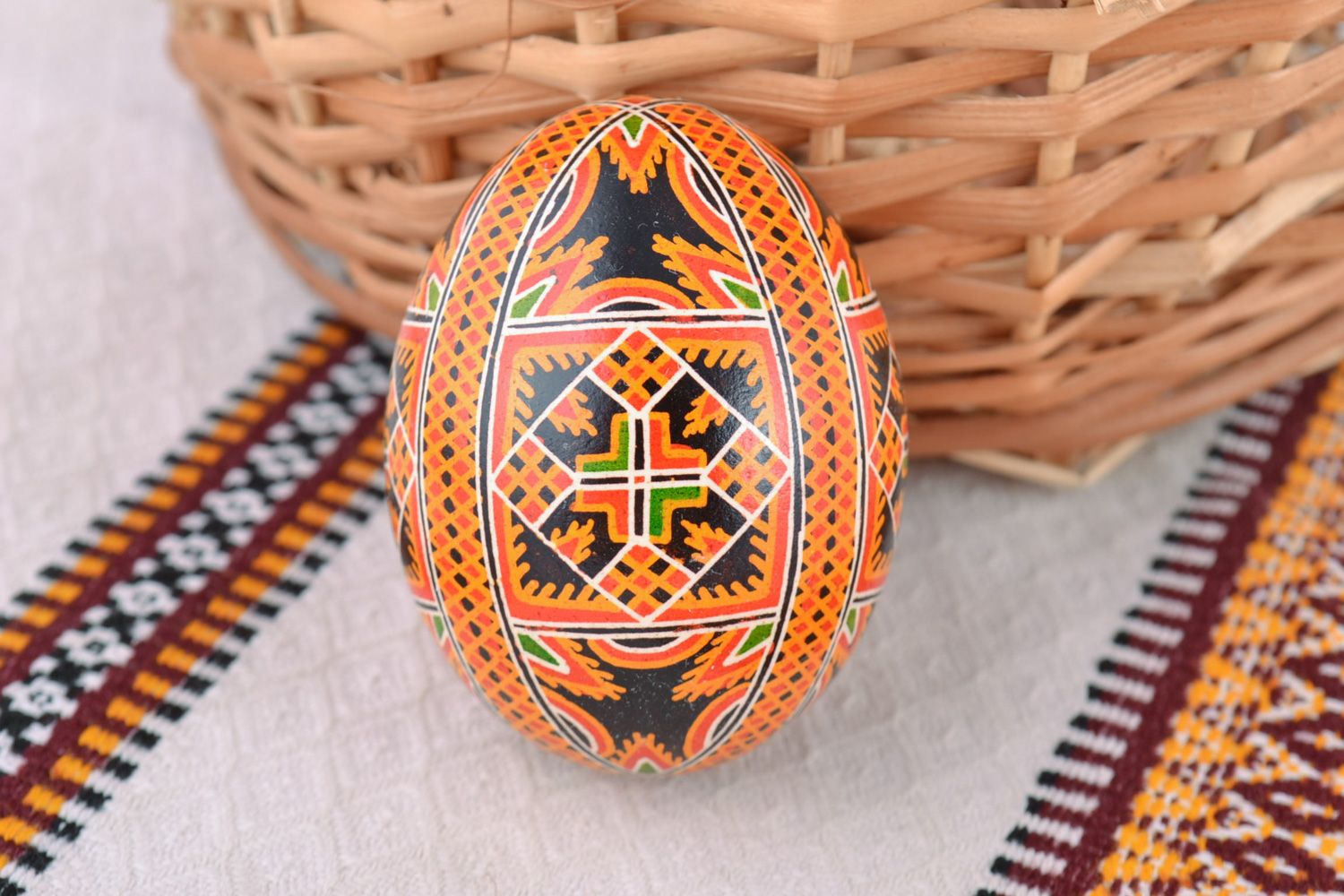 Homemade bright painted Easter egg with multi-colored ornament photo 1