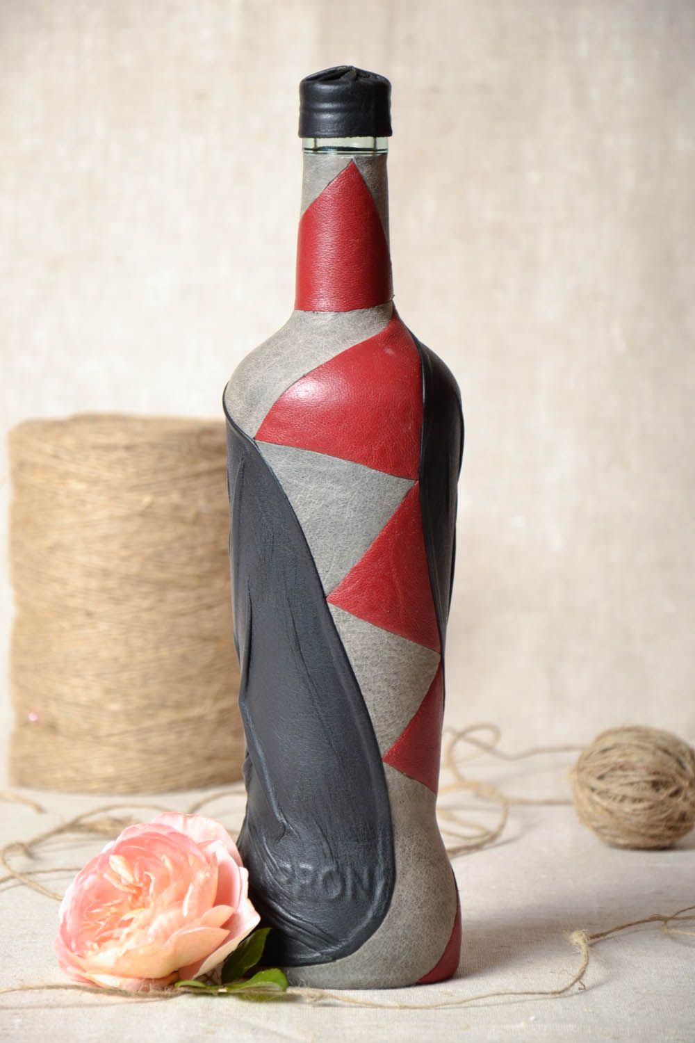 Decorative bottle made of leather  photo 1