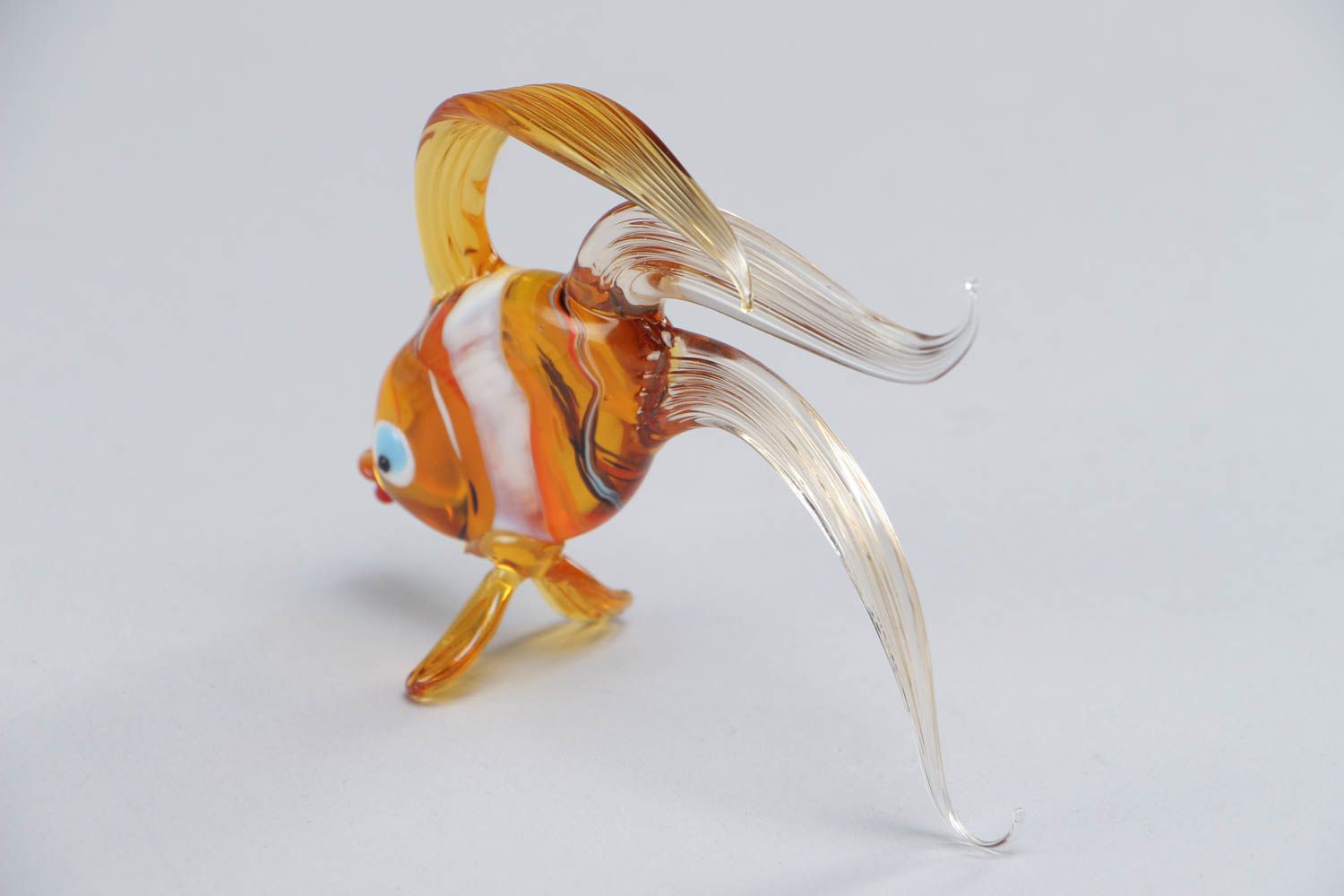 Figura artesanal de vidrio en la técnica de lampwork hecha a mano Pez dorado foto 4