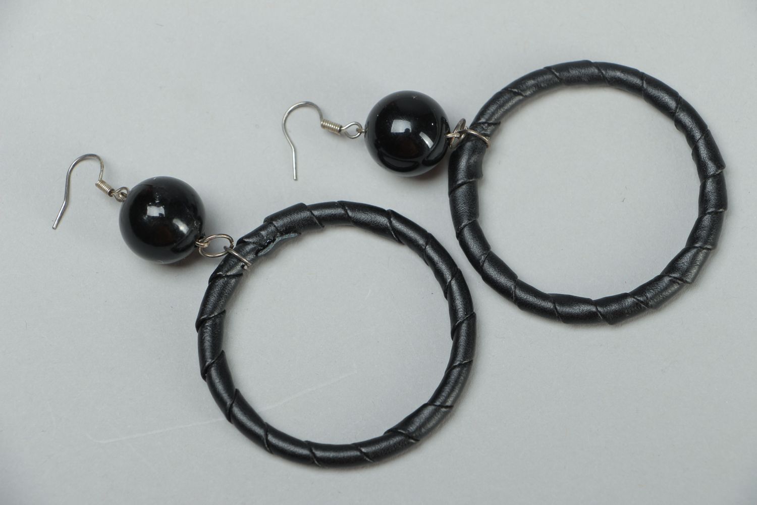 Artificial leather hoop earrings with beads photo 1