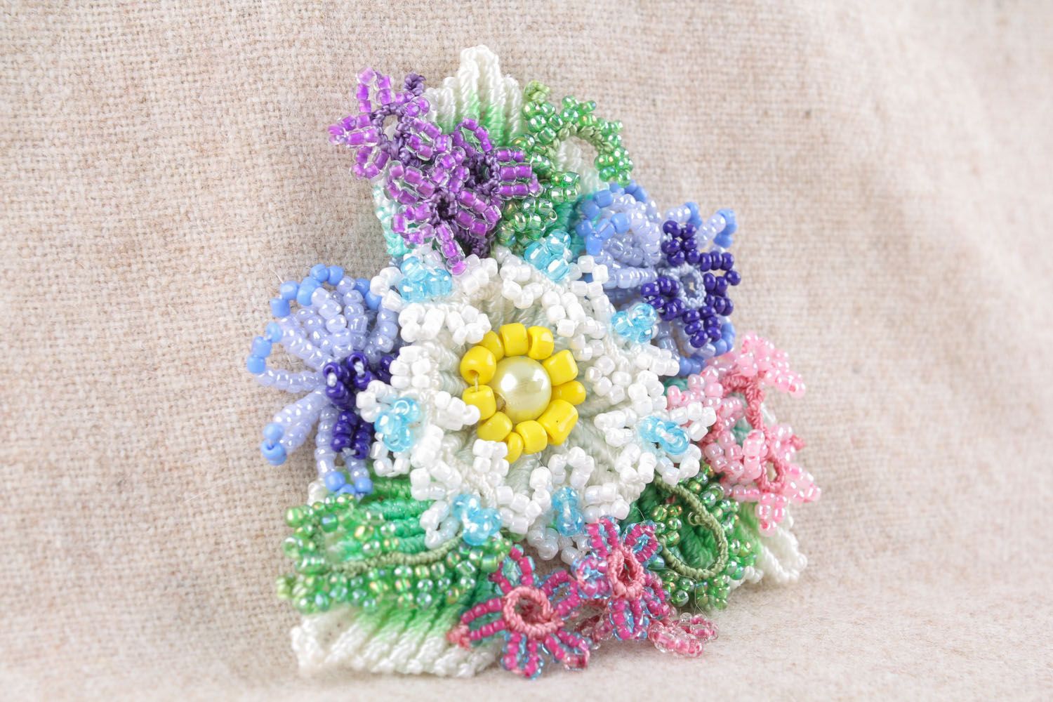 Brooch made of threads and beads photo 1