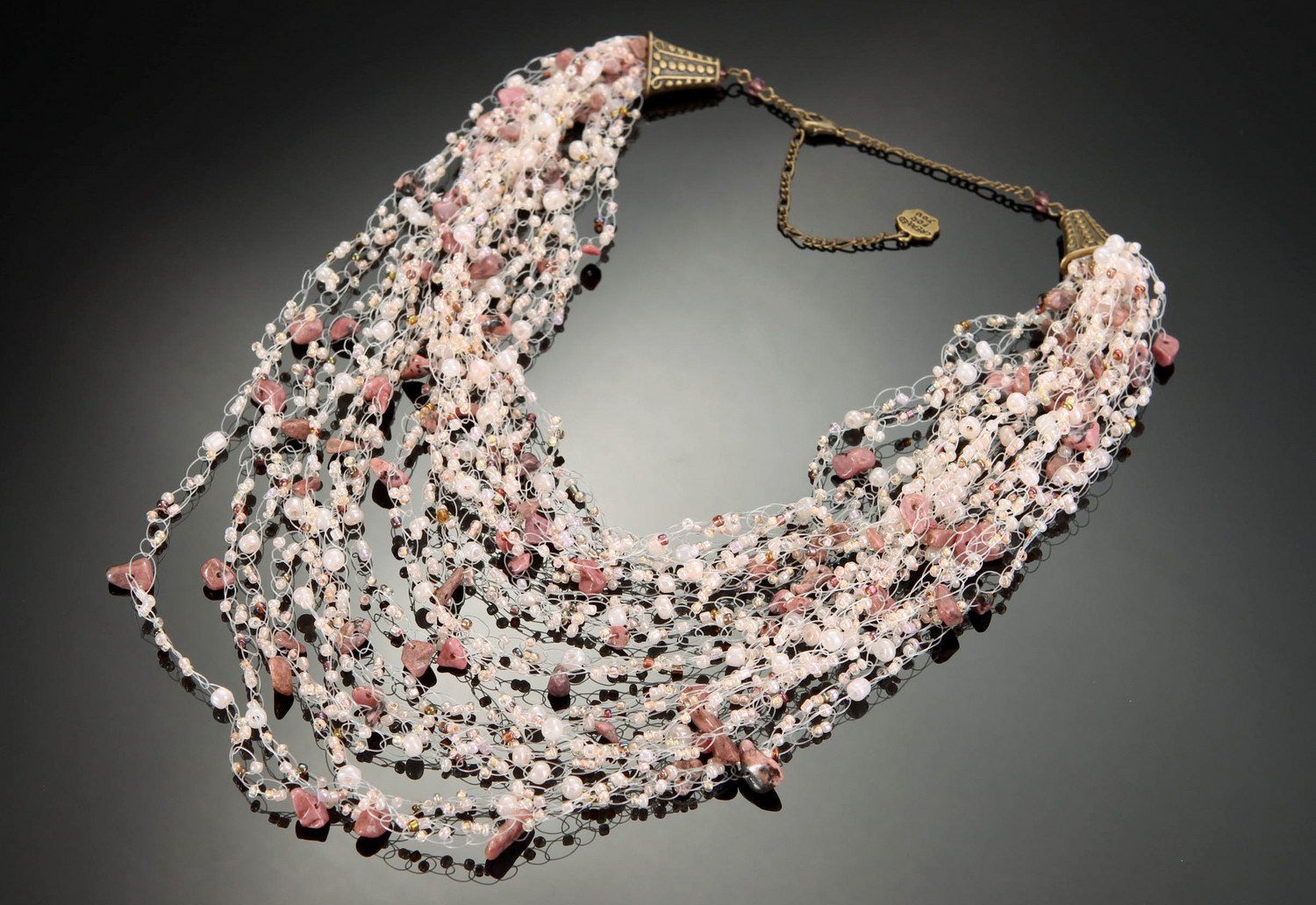 Necklace made of rhodonite fragments photo 1