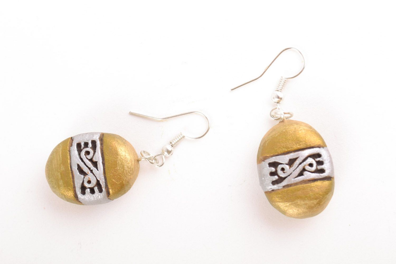 Unusual handmade ceramic dangling earrings of oval shape and golden color photo 5