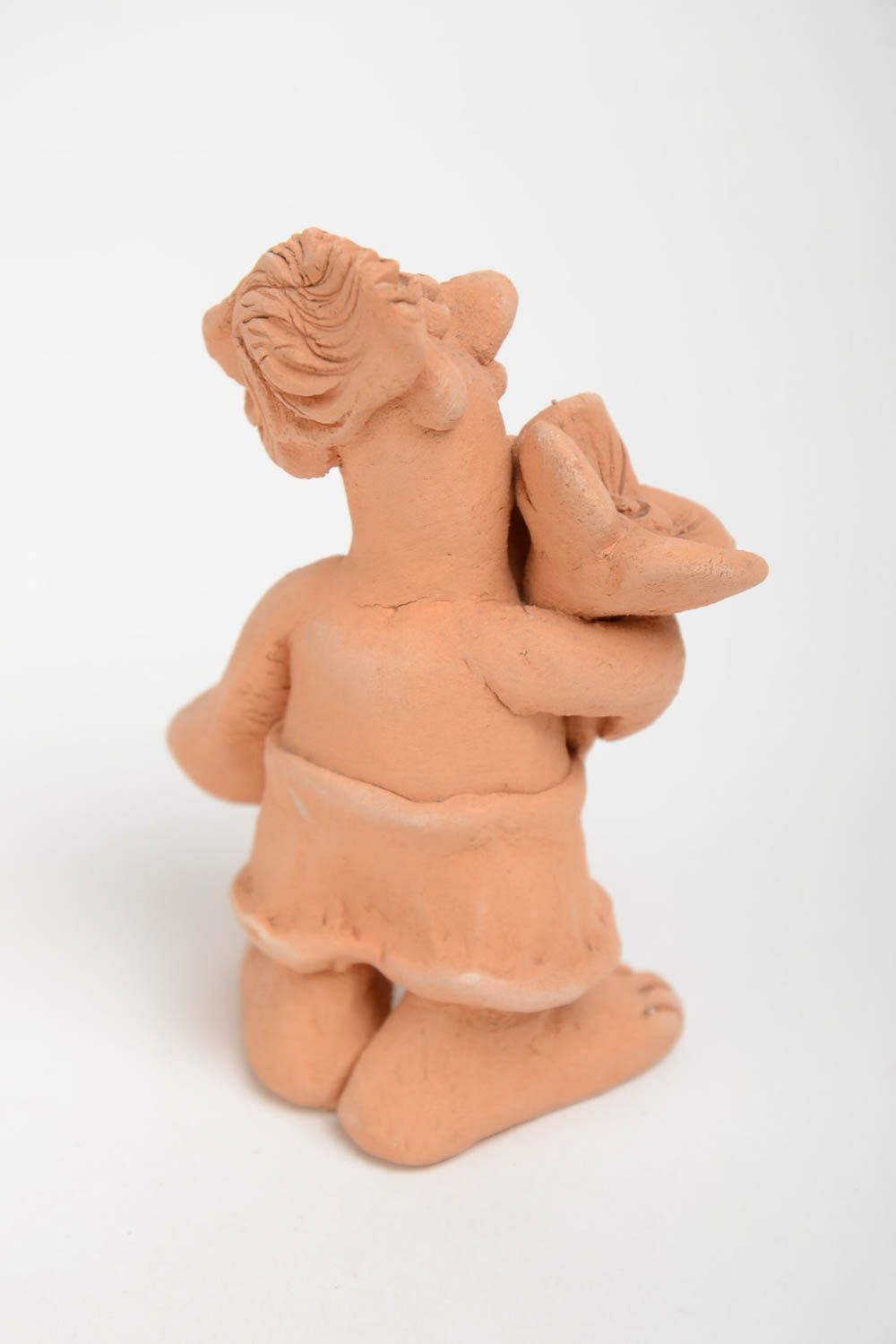 Figurine en terre cuite faite main beige petite décorative Homme avec fleur photo 3