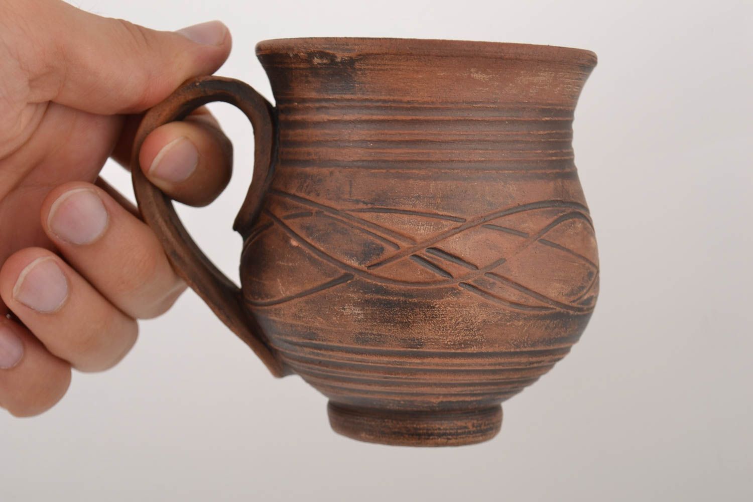 Unglazed clay cup with handle and handmade pattern 0,52 lb photo 4