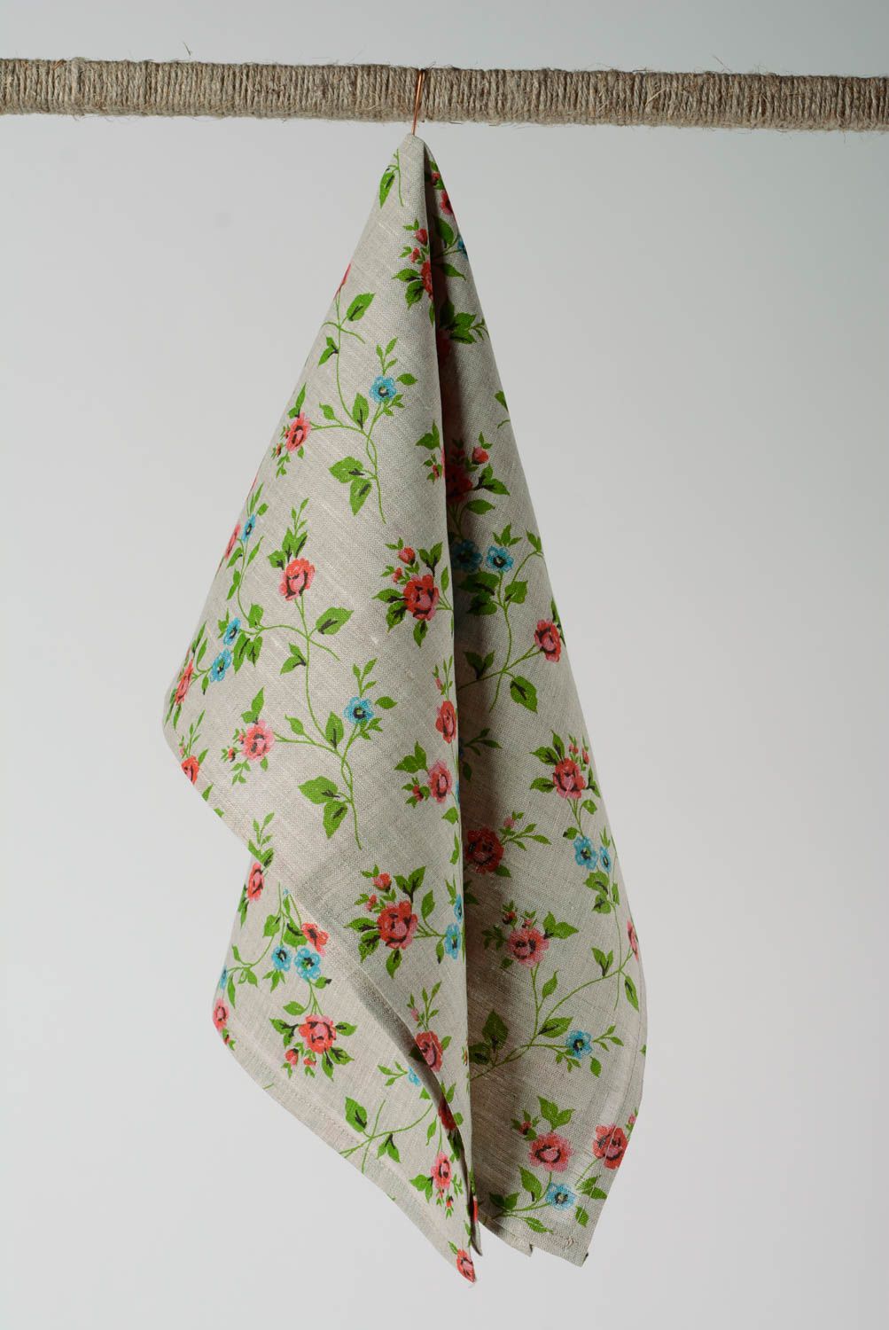 Handmade beautiful kitchen towel sewn of linen fabric with tender floral pattern photo 1