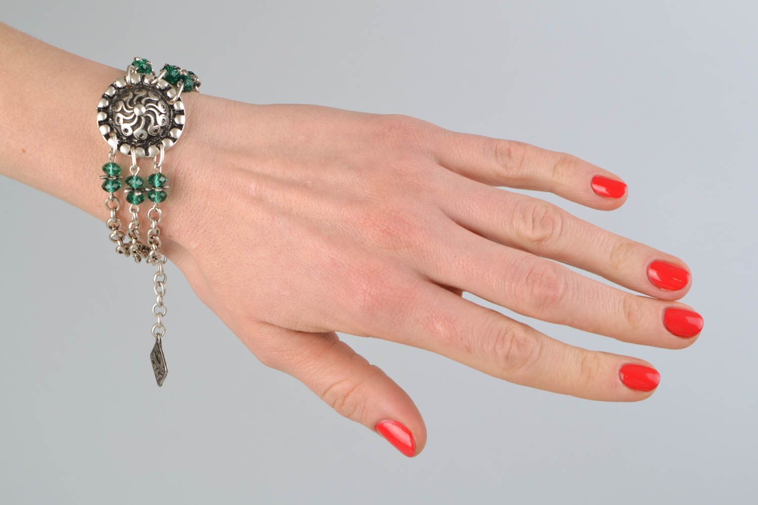 Bracelet en métal et perles de cristal massif couleur argentée et verte photo 2