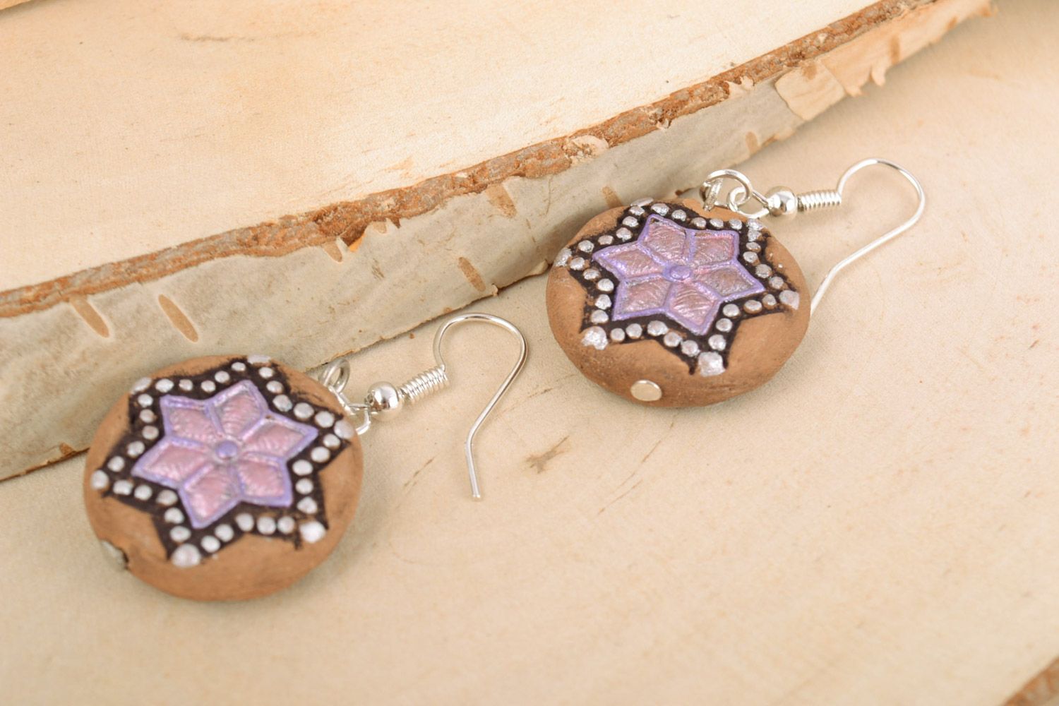Small round handmade ceramic dangling earrings with tender violet ornament photo 1