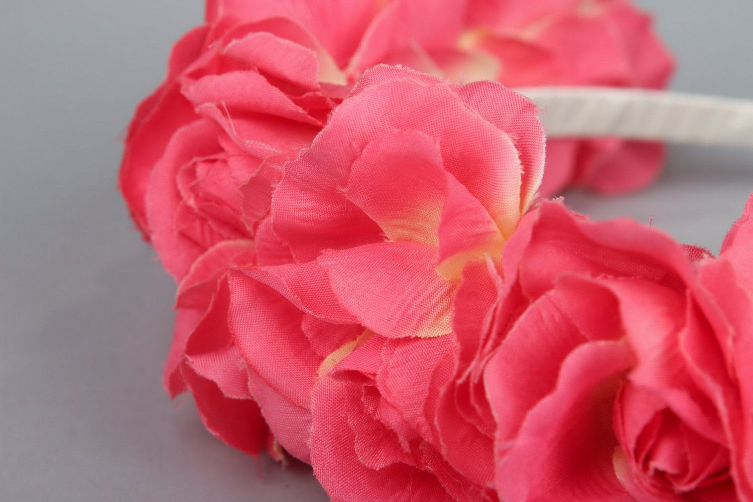 Pink wreath made of fabric flowers photo 2