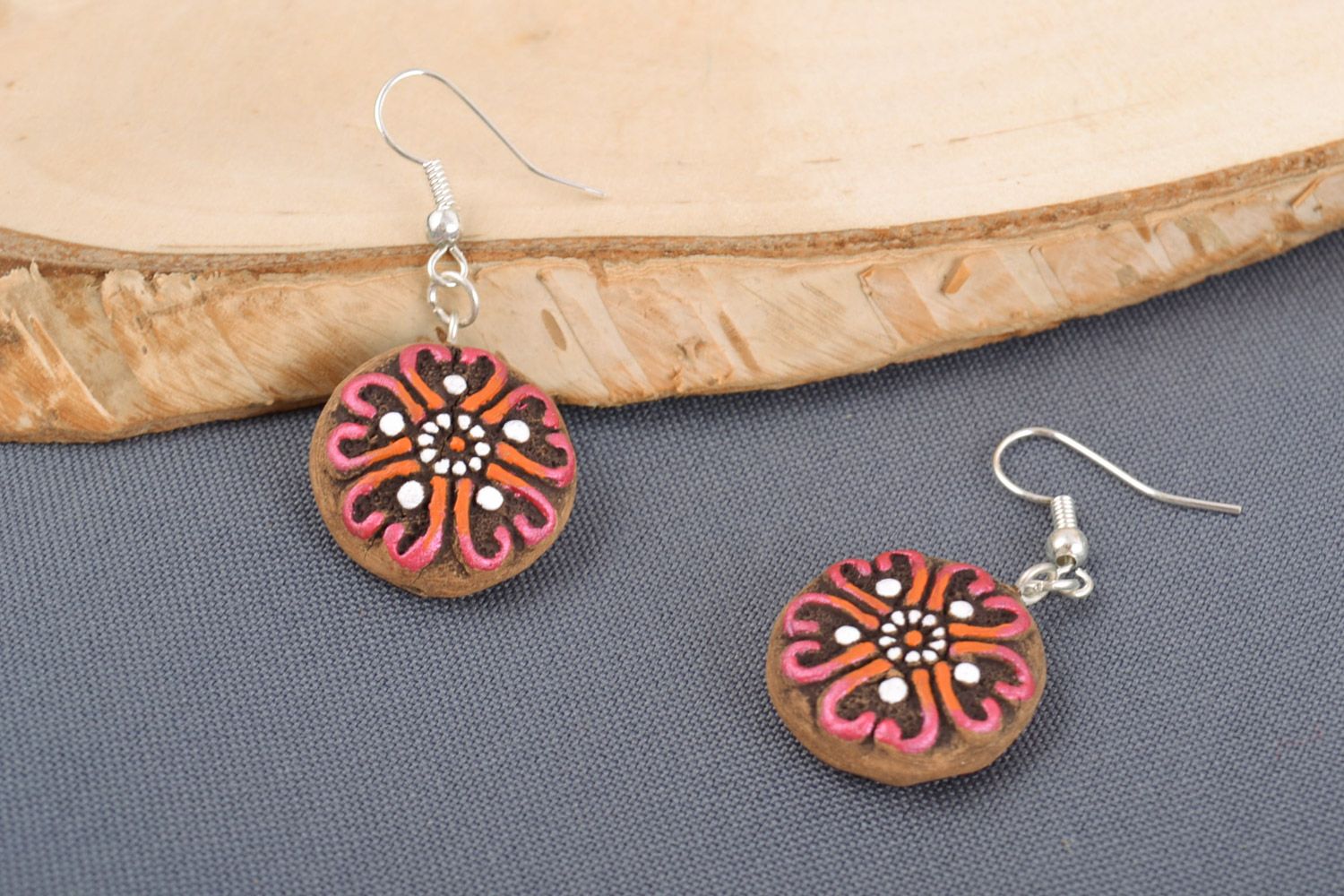 Small round dangling earrings molded of clay and painted with acrylics handmade photo 1