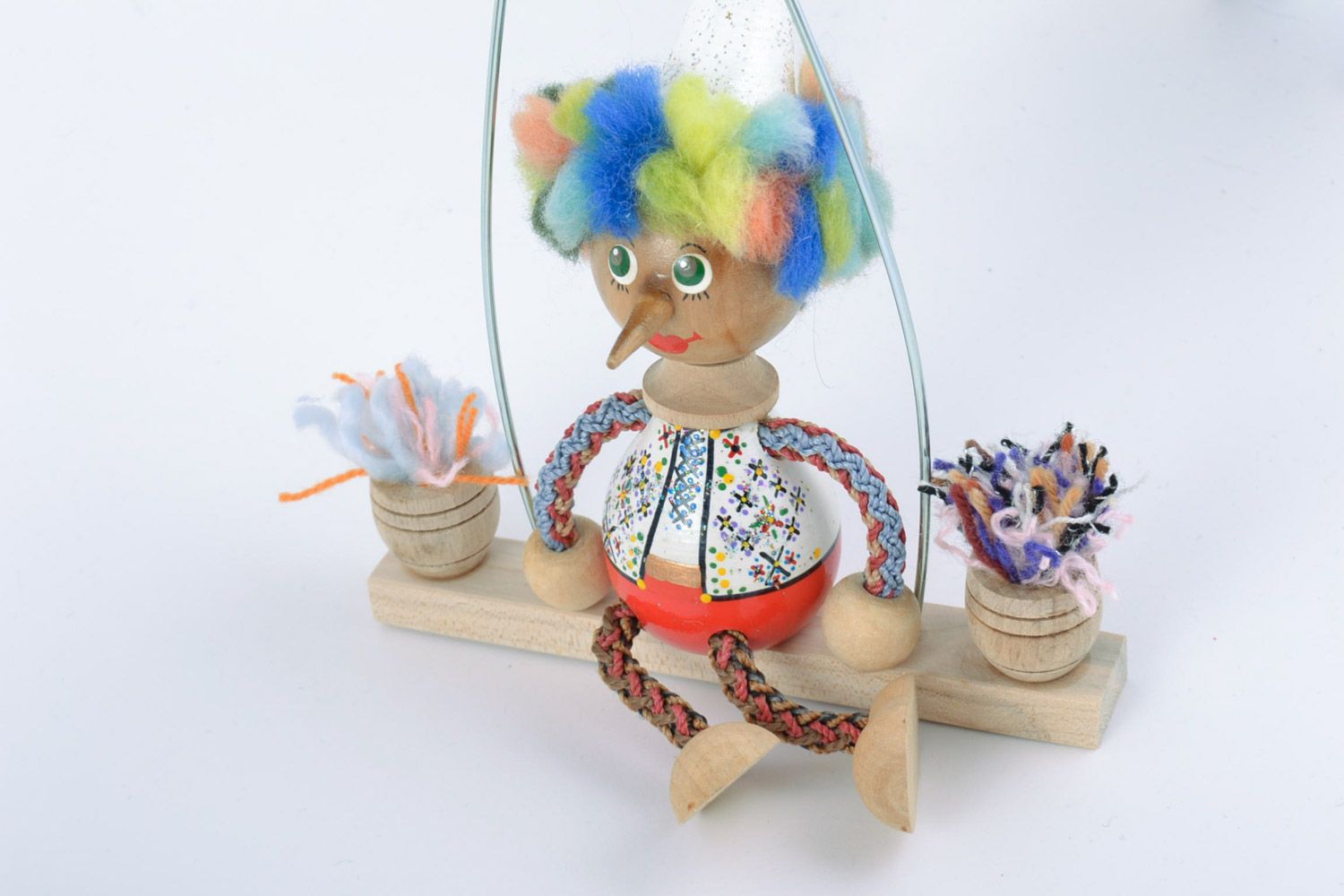 Children's designer handmade wooden toy boy on swing with painting photo 4
