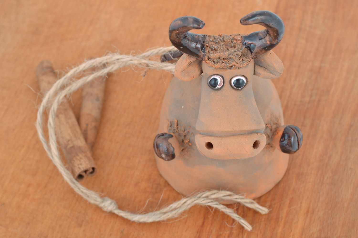Handmade hanging painted ceramic bell Bull with cord for kitchen decoration photo 1